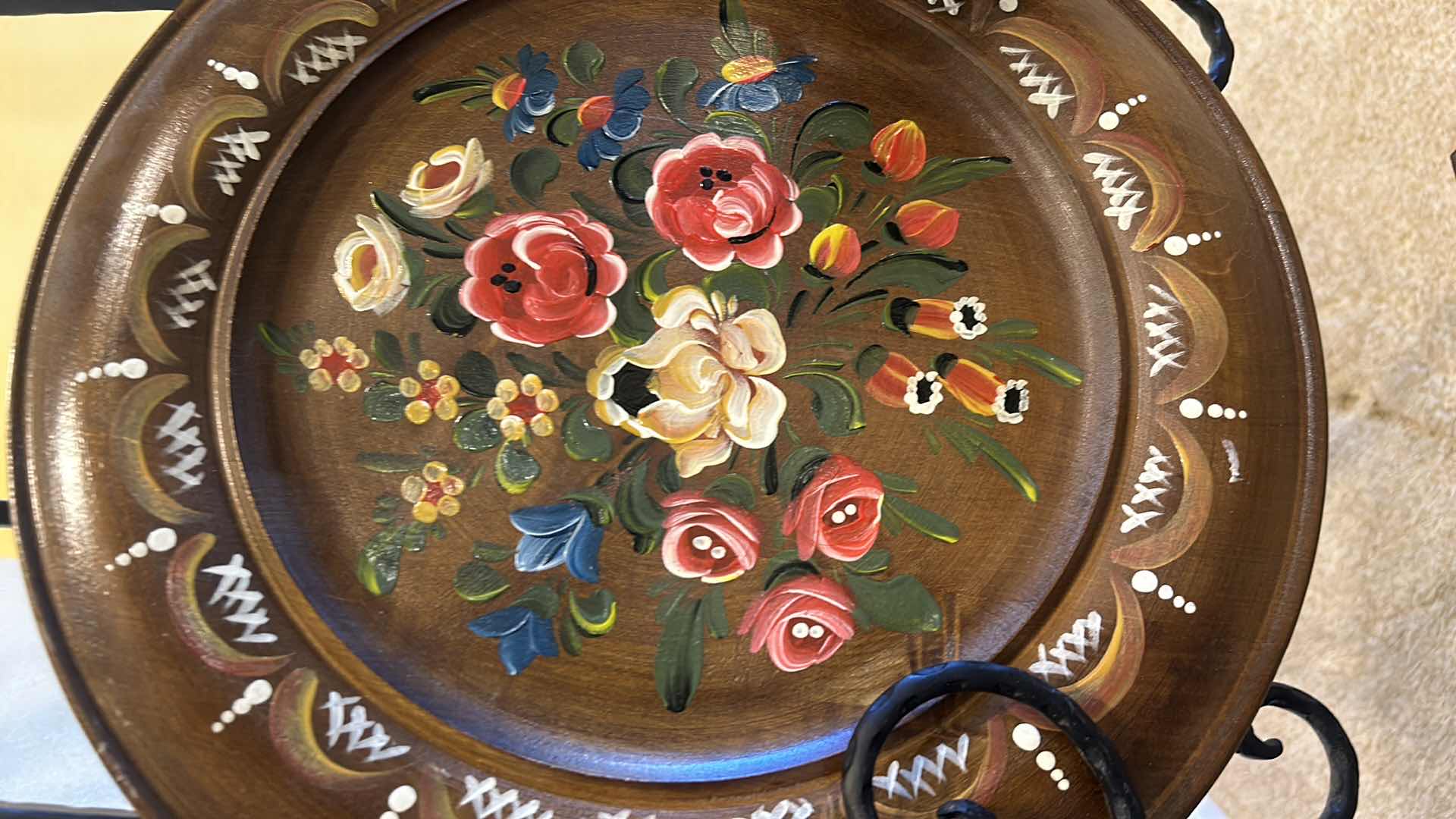 Photo 2 of TWO HAND-PAINTED WOOD PIECES. ROUND PLATE  MEASURES 14”.