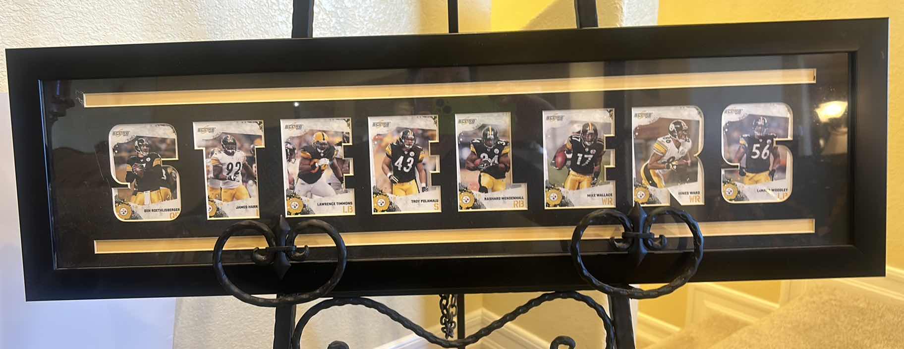 Photo 1 of FRAMED STEELERS FOOTBALL CARD ARTWORK 30” X H 9”.