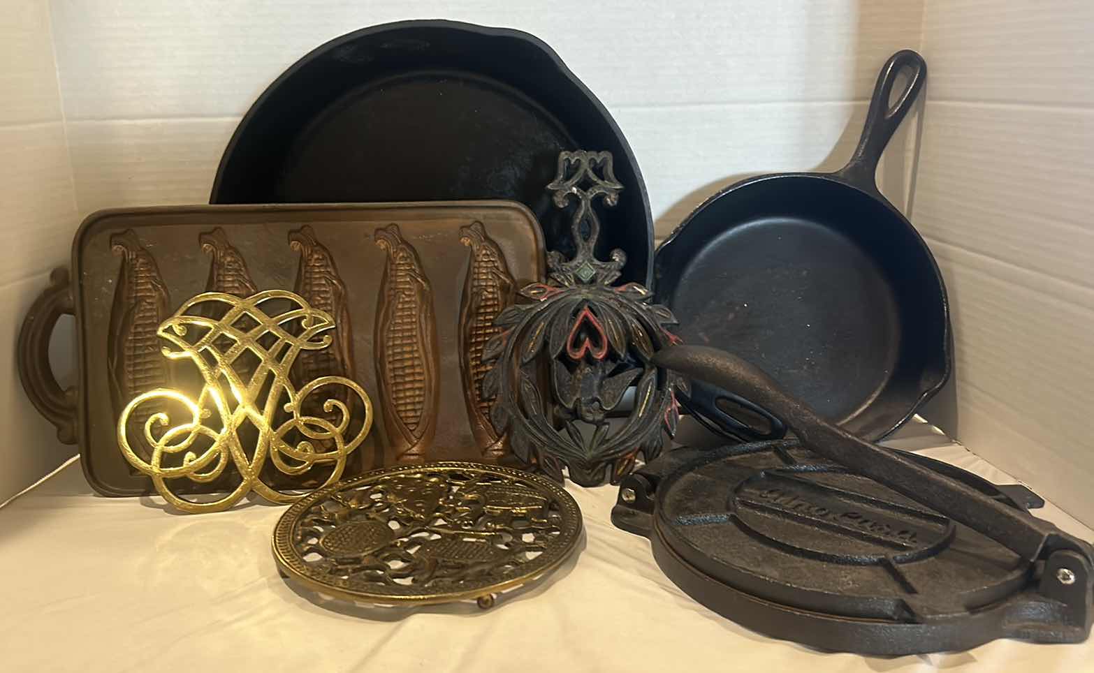 Photo 1 of 7 PC - CAST IRON PANS, METAL TRIVETS