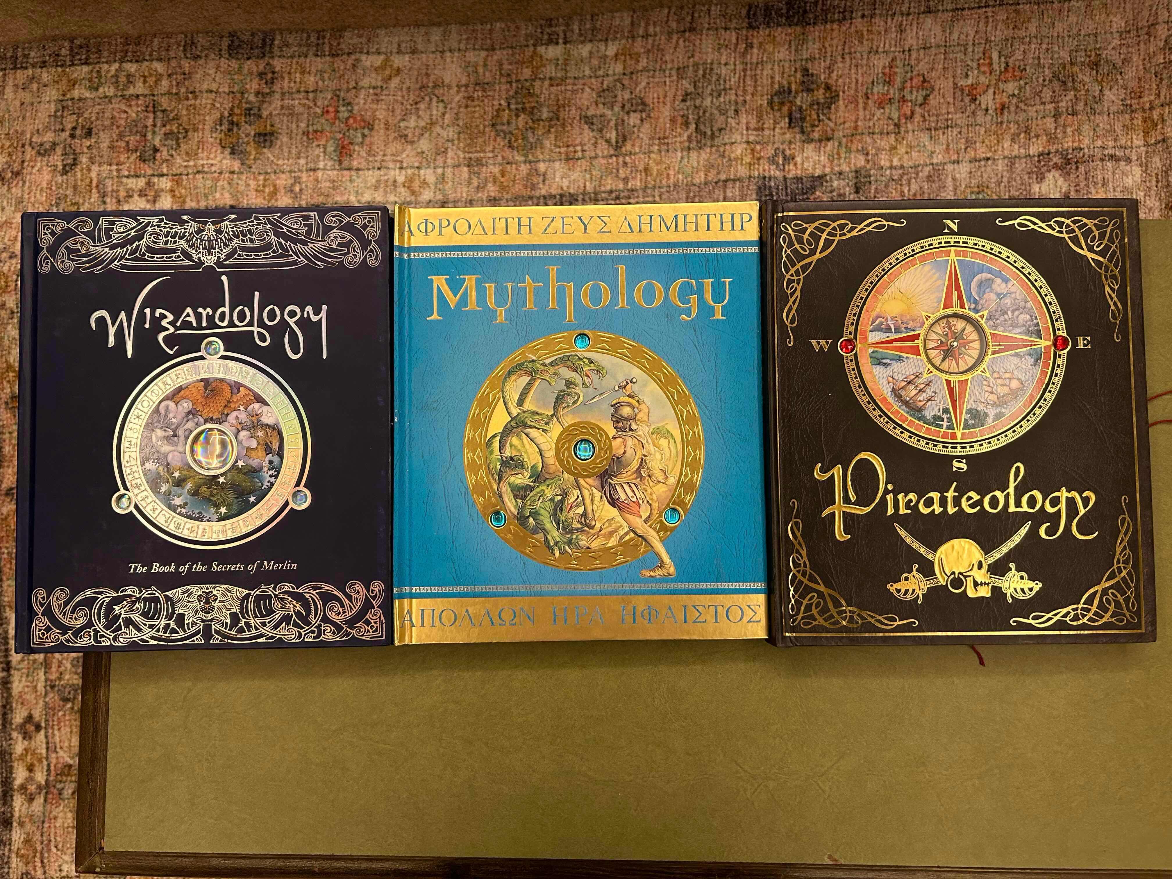 Photo 1 of 3-HARDBOUND BOOKS OF WIZARDOLOGY,  MYTHOLOGY, PIRATEOLOGY