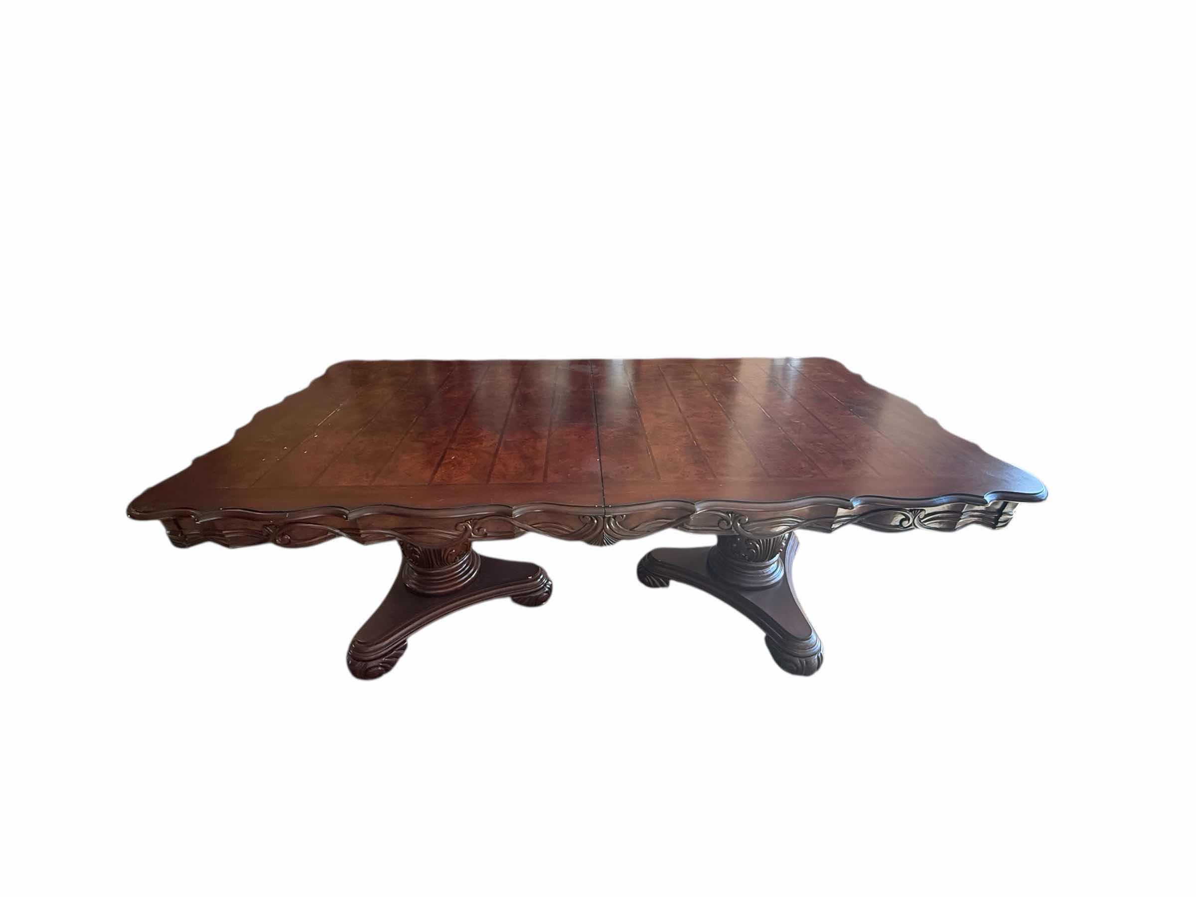 Photo 1 of HEAVY MAHOGANY PEDESTAL CARVED DINING TABLE (81” x 43” H30”) W 2-INSERTS (18” x 42”)-CHAIRS SOLD SEPARATELY