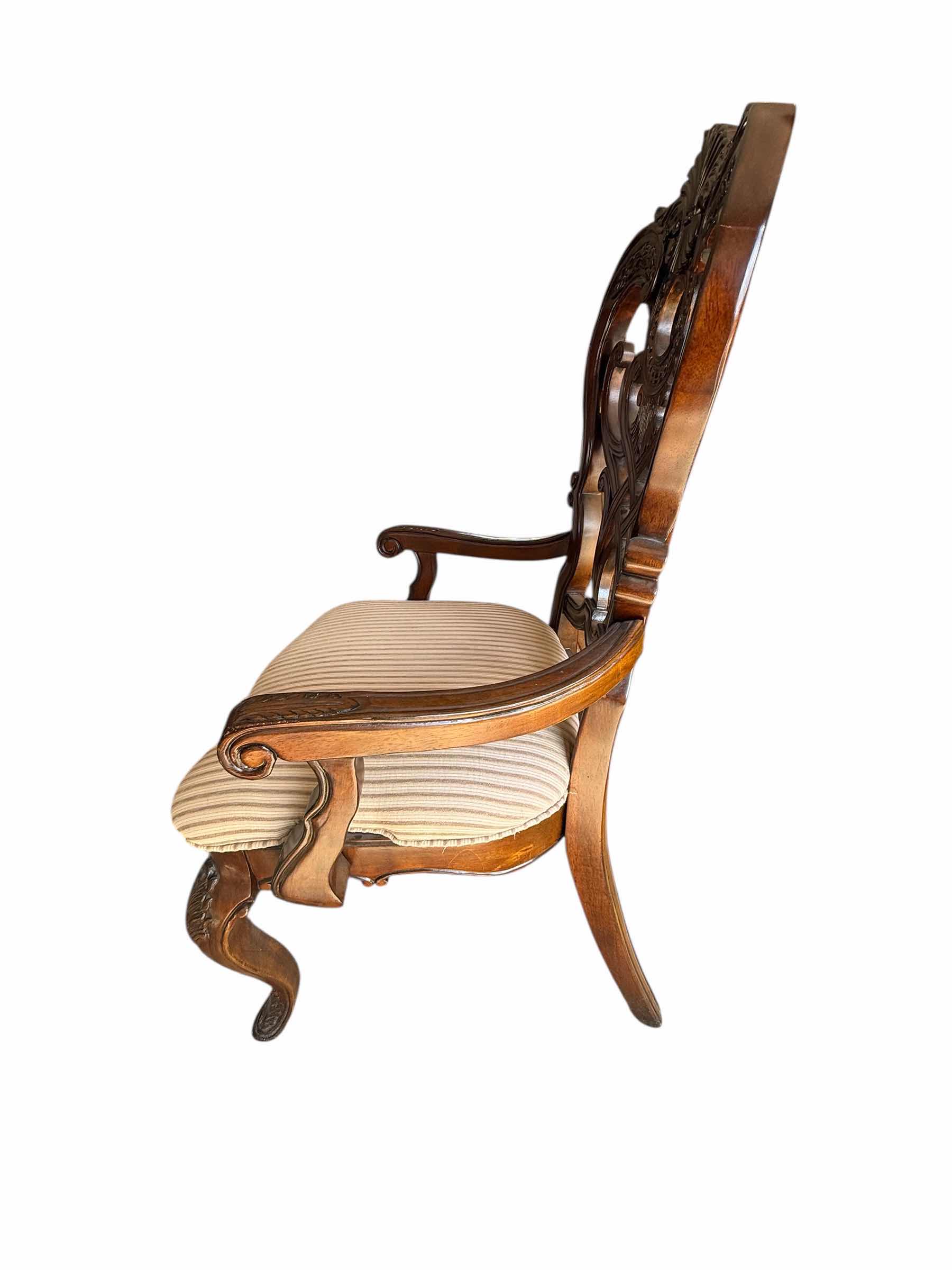 Photo 1 of HEAVY MAHOGANY ORNATE CARVED DINING ARM CHAIR W BEIGE STRIPED UPHOLSTERED SEAT
