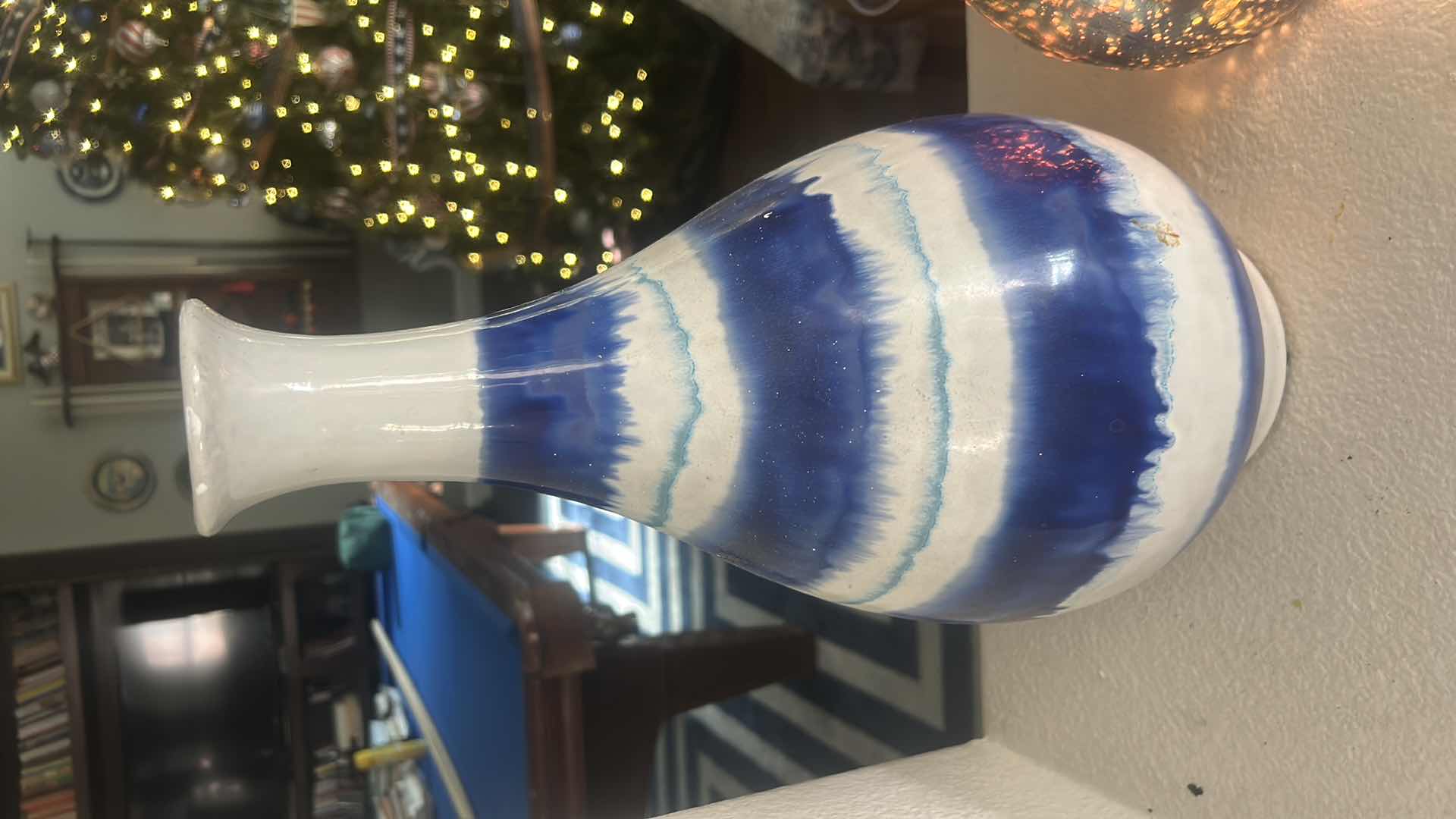 Photo 1 of HOME DECOR AND ACCESSORIES- BLUE AND WHITE VASE, WAX MELT, CANDLE HOLDER, 4 PLACEMATS AND TABLE CLOTH