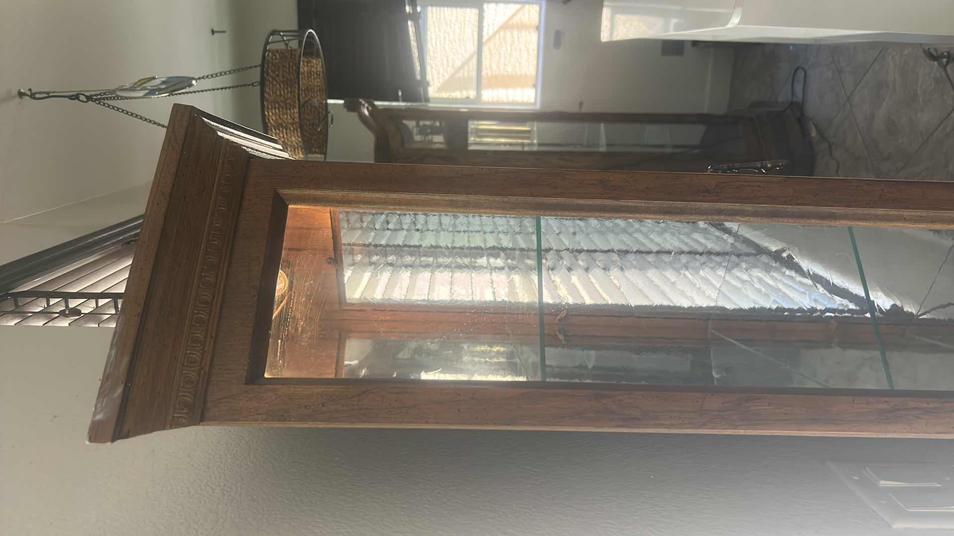 Photo 1 of VINTAGE ILIGHTED WOOD CURIO CABINET WITH WAVY GLASS 25” x 11” x H70”