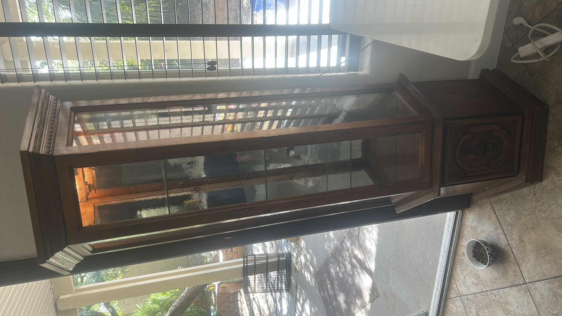 Photo 1 of VINTAGE ILIGHTED WOOD CURIO CABINET WITH WAVY GLASS 25” x 11” x H70”