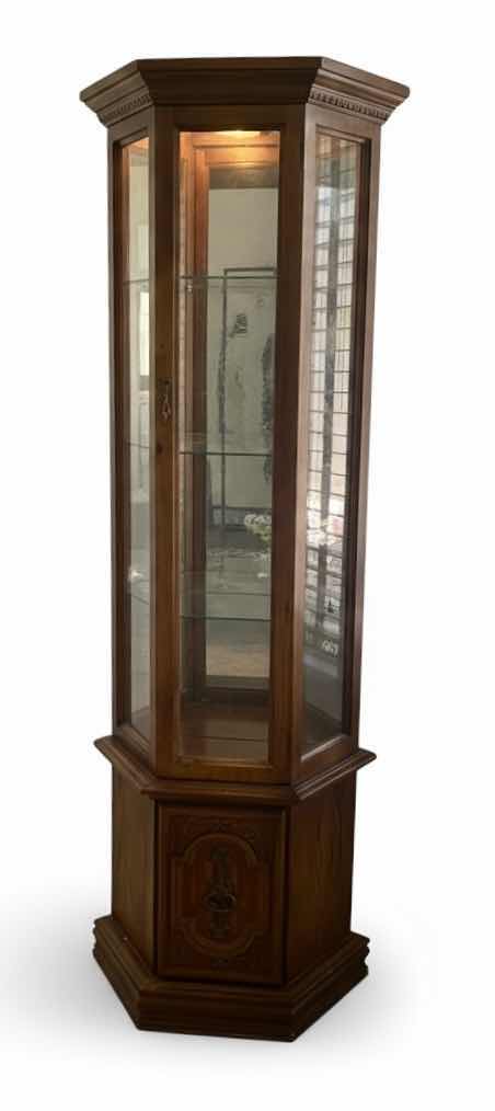 Photo 1 of VINTAGE ILIGHTED WOOD CURIO CABINET WITH WAVY GLASS 25” x 11” x H70”