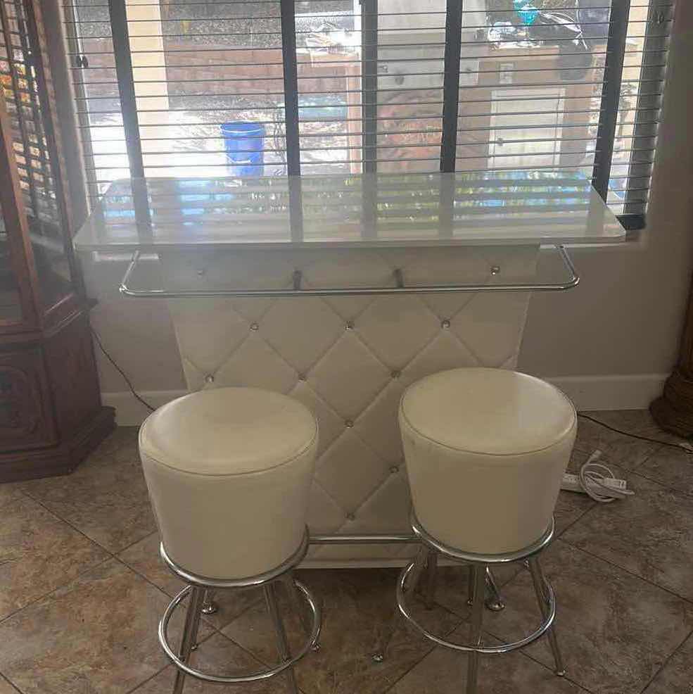 Photo 1 of FURNITURE OF AMERICA FUERO WHITE BAR TABLE WITH BUTTON TUFTING AND FAUX LEATHER UPHOLSTERY 47 1/4“ x 19 1/2“ x 42“ WITH 2 SWIVEL STOOLS. H29.25” $800