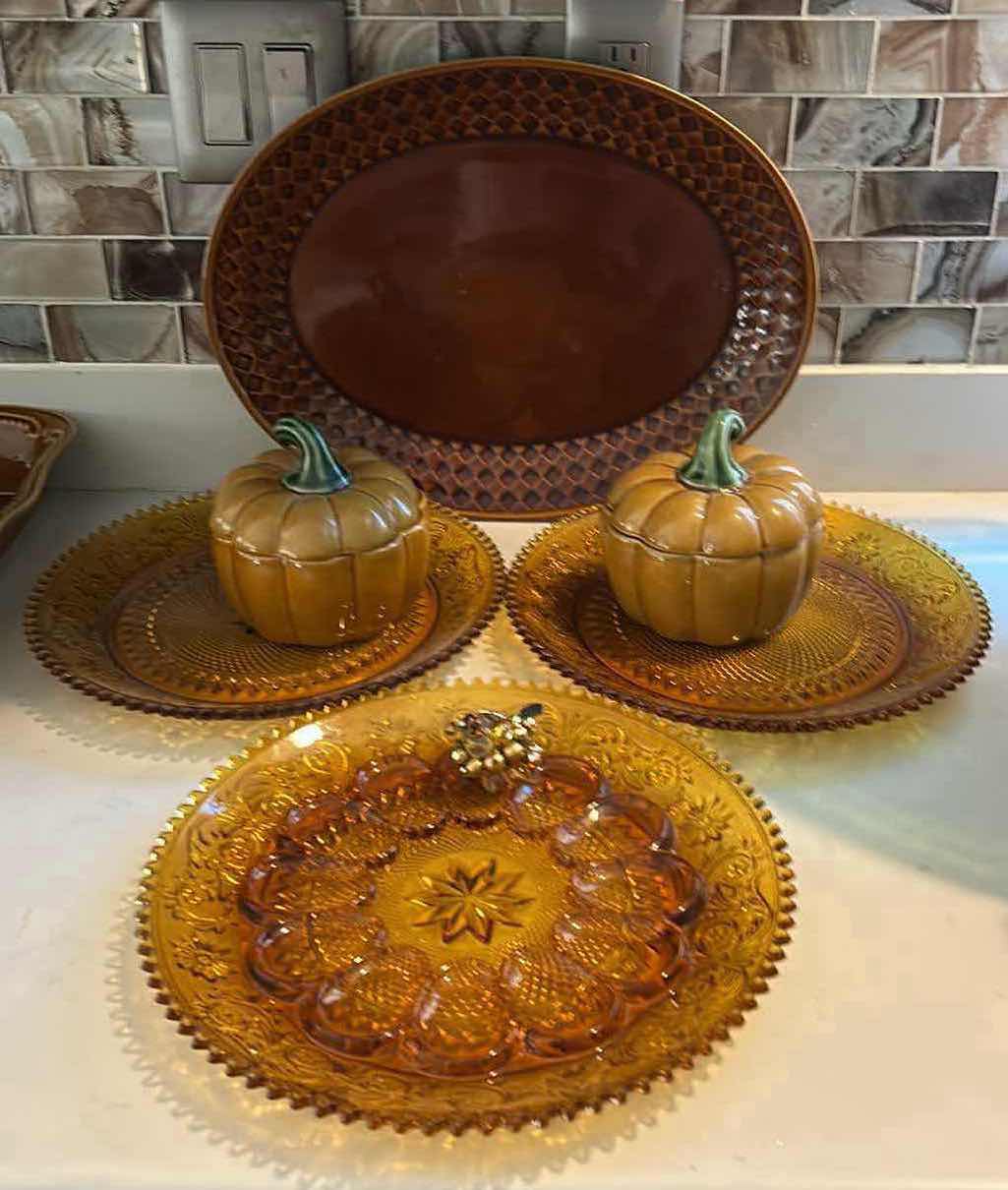 Photo 1 of AMBER GlASS PLATES, CERAMIC PUMPKINS AND DEEP BROWN/ AMBER CERAMIC PLATTER