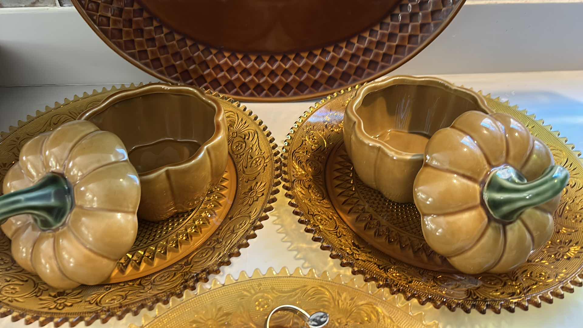 Photo 1 of AMBER GlASS PLATES, CERAMIC PUMPKINS AND DEEP BROWN/ AMBER CERAMIC PLATTER