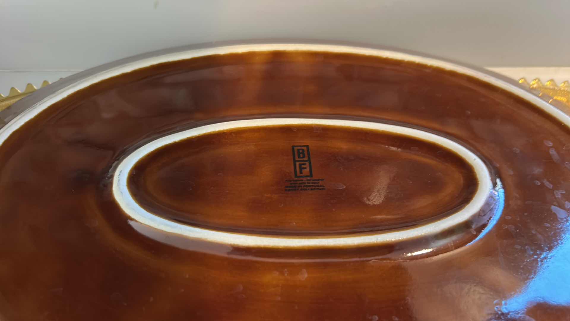 Photo 1 of AMBER GlASS PLATES, CERAMIC PUMPKINS AND DEEP BROWN/ AMBER CERAMIC PLATTER