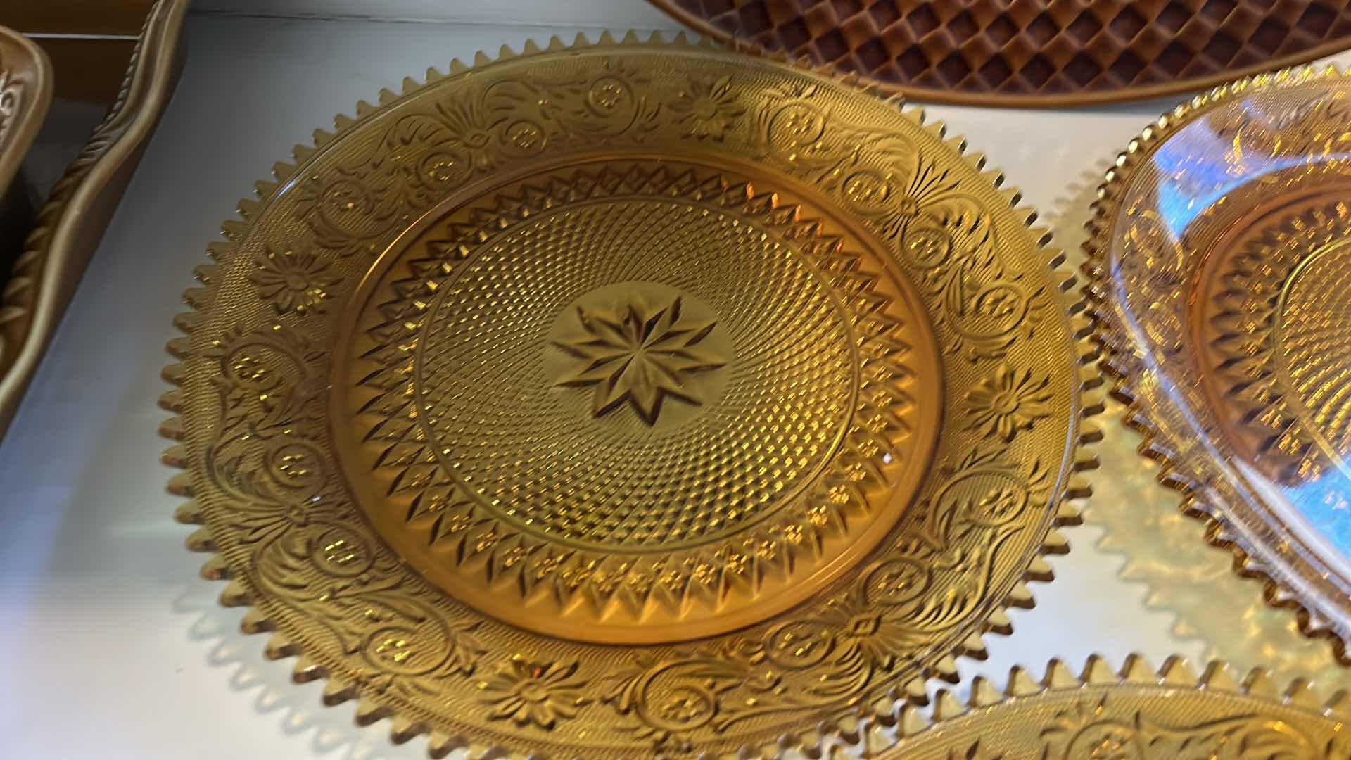 Photo 1 of AMBER GlASS PLATES, CERAMIC PUMPKINS AND DEEP BROWN/ AMBER CERAMIC PLATTER