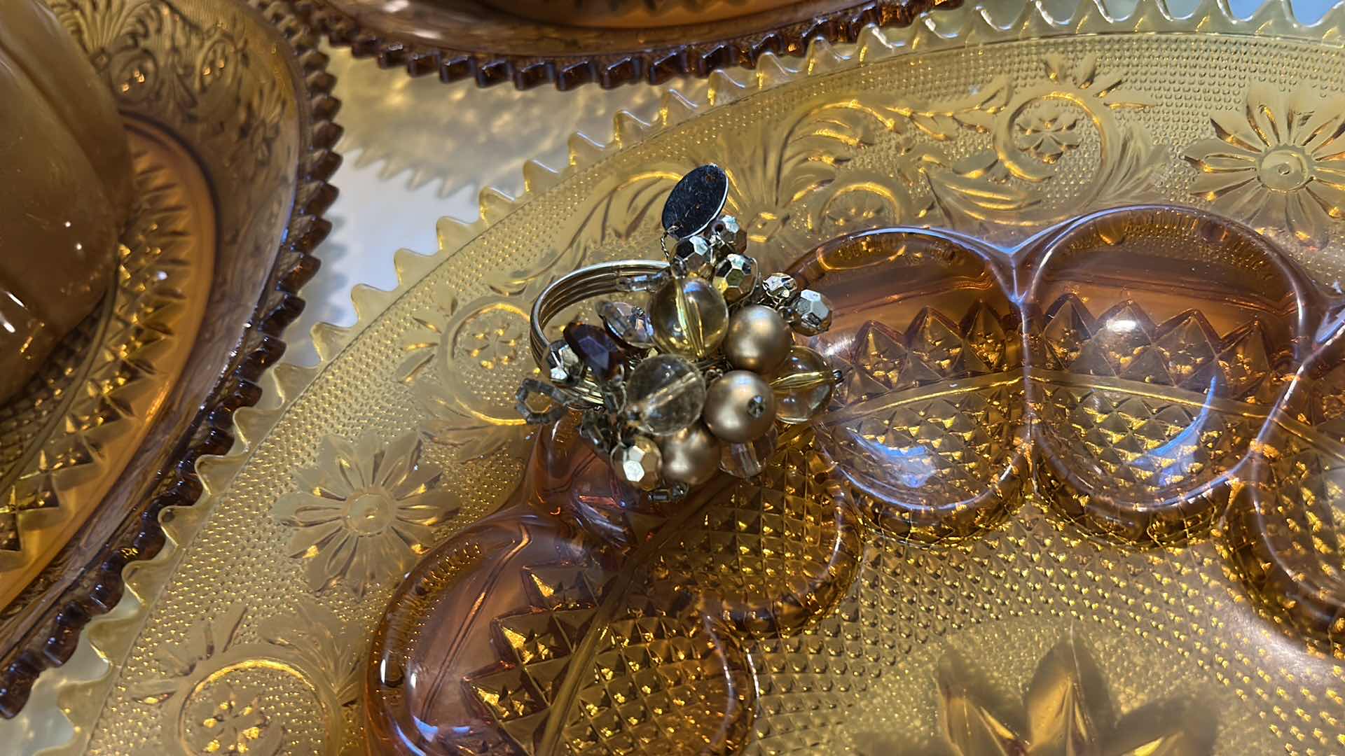 Photo 1 of AMBER GlASS PLATES, CERAMIC PUMPKINS AND DEEP BROWN/ AMBER CERAMIC PLATTER