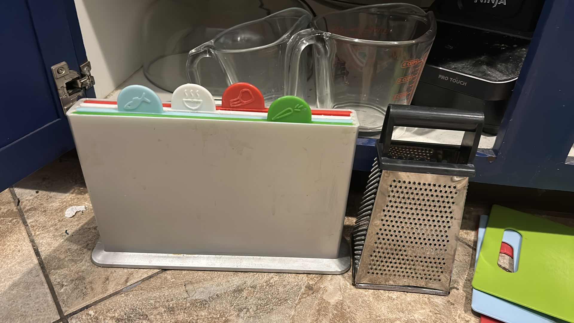 Photo 1 of CONTENTS OF CABINET IN KITCHEN