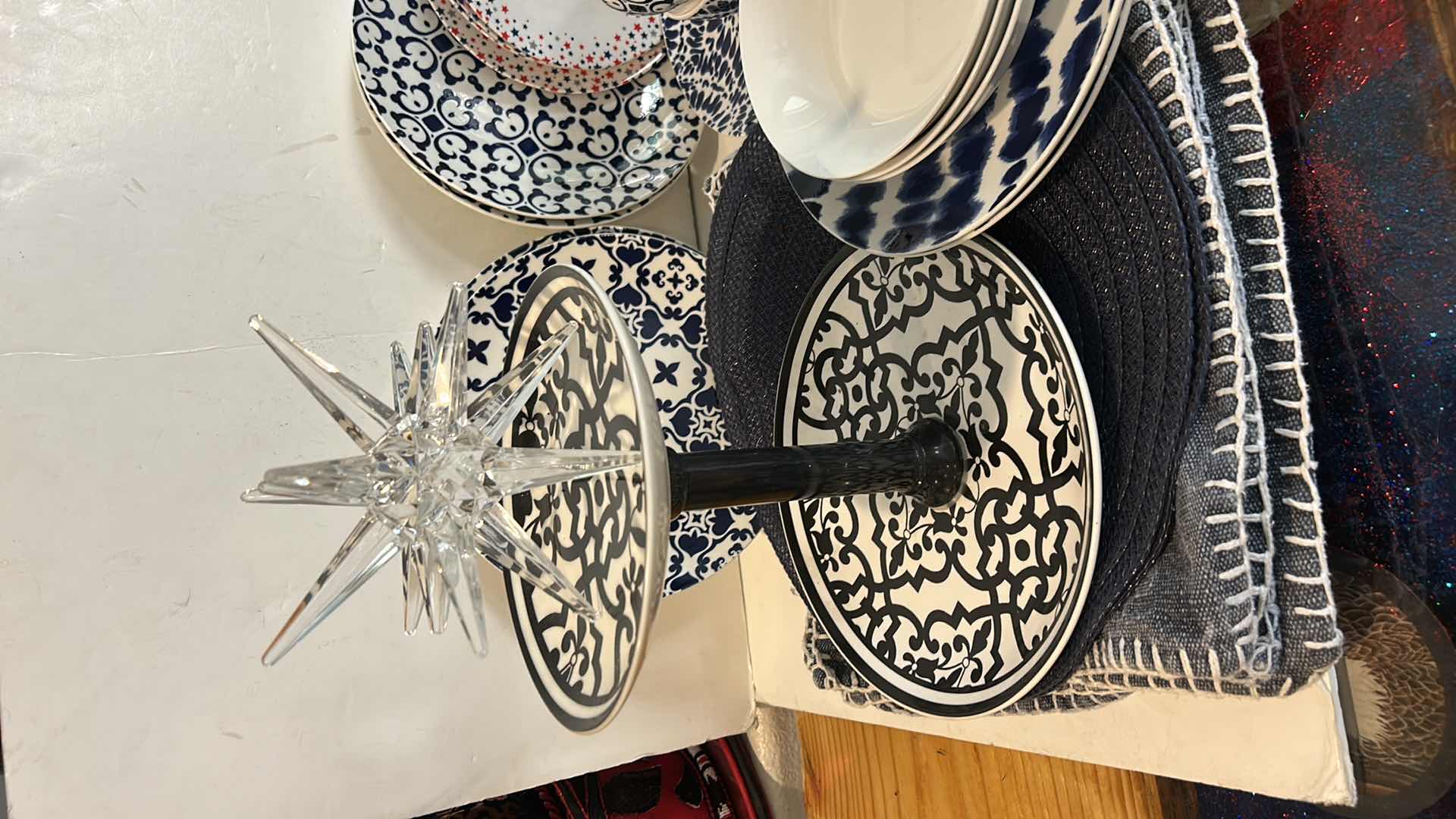 Photo 1 of PLACEMATS, BLUE AND WHITE PLATES, BOWLS AND ACRYLIC STAR