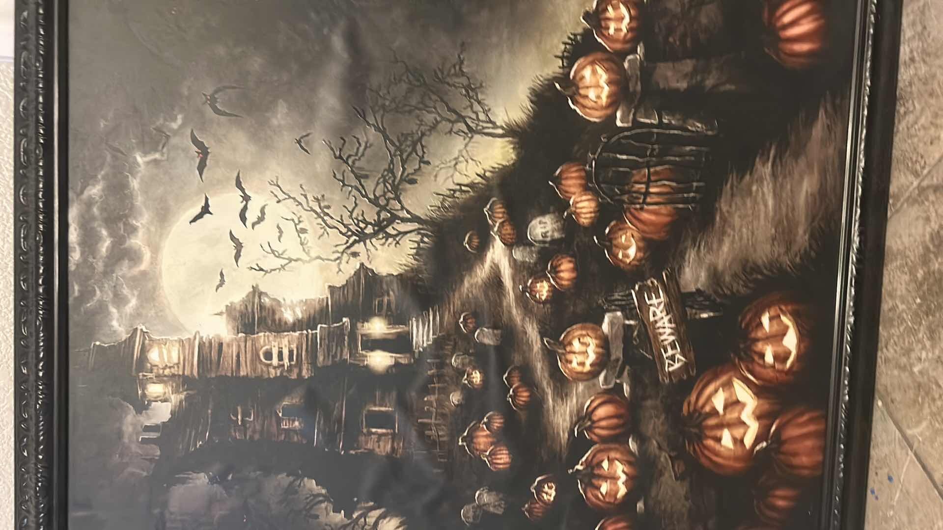 Photo 1 of BLACK WOOD FRAMED BATTERY OPERATED LIGHT UP HAUNTED HOUSE ARTWORK FOR HALLOWEEN AND MORE 
25” x 31”