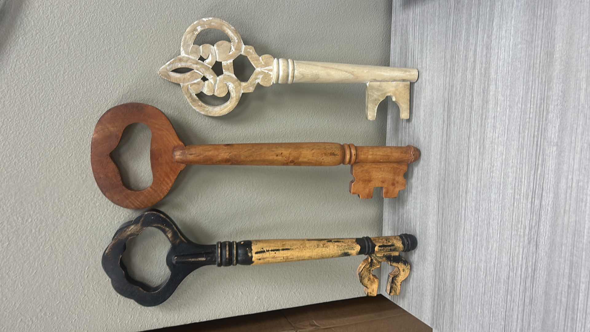 Photo 1 of 3 WOODEN DECORATIVE KEYS (TALLEST H24”)