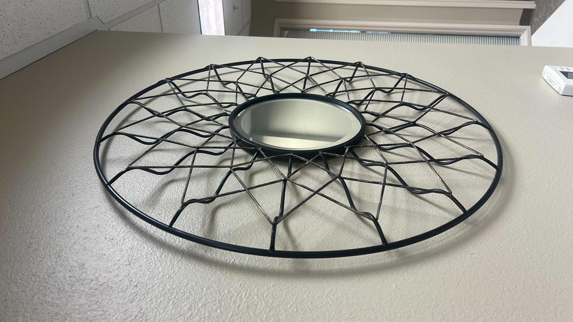 Photo 1 of BLACK METAL GEOMETRIC WALL MIRROR 33”