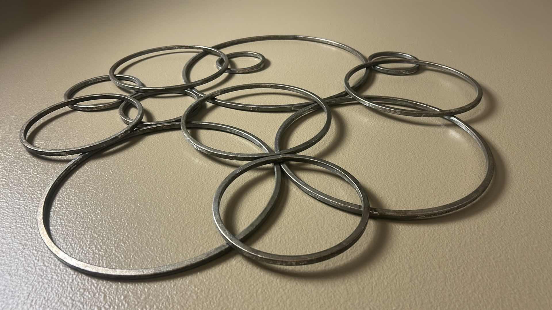 Photo 1 of METAL CIRCLE WALL SCULPTURE 30” x H31”