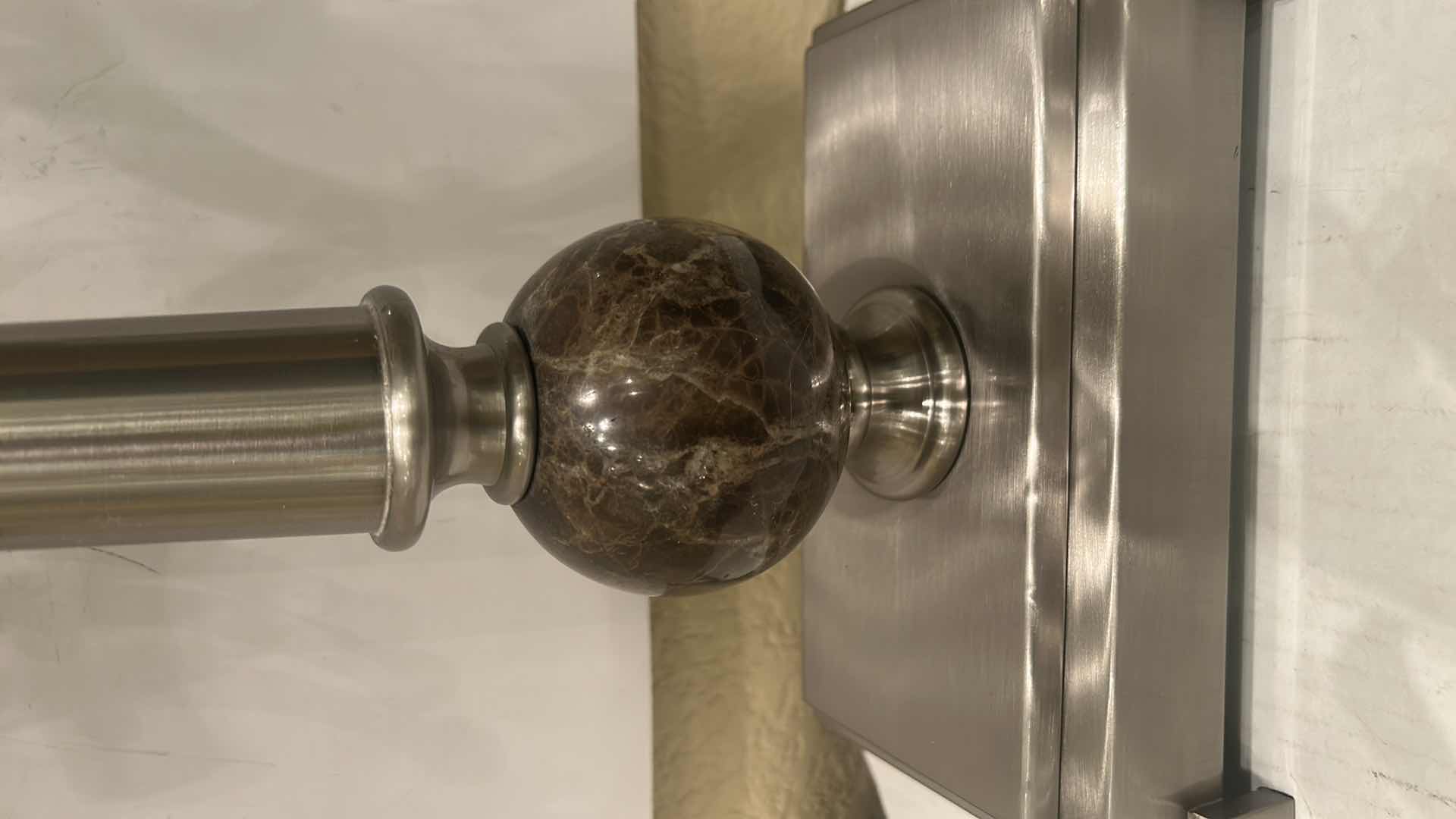 Photo 1 of - METAL THREE-ARM CANDELABRA, POSSIBLY WITH A PEWTER, SILVER, OR BRUSHED METAL FINISH. H26”