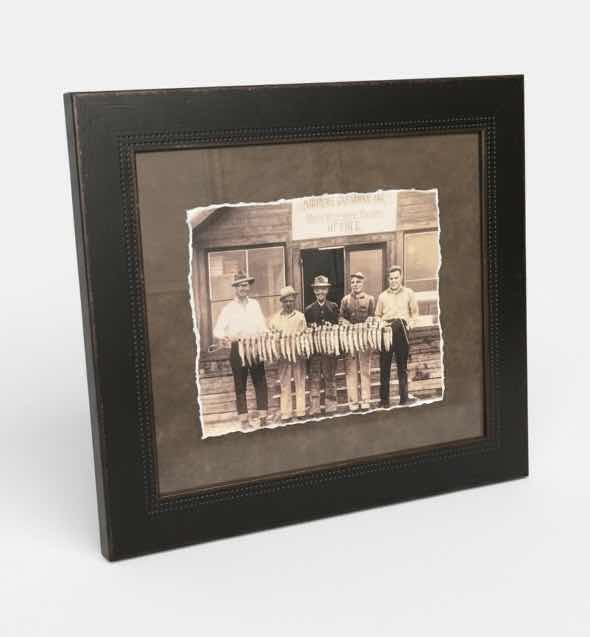 Photo 1 of FRAMED, VINTAGE-STYLE BLACK-AND-WHITE PHOTOGRAPHIC PRINT “FISHING GROUP” FEATURING A GROUP OF MEN POSED WITH A ROW OF FISH, ARTWORK 24” x H21”