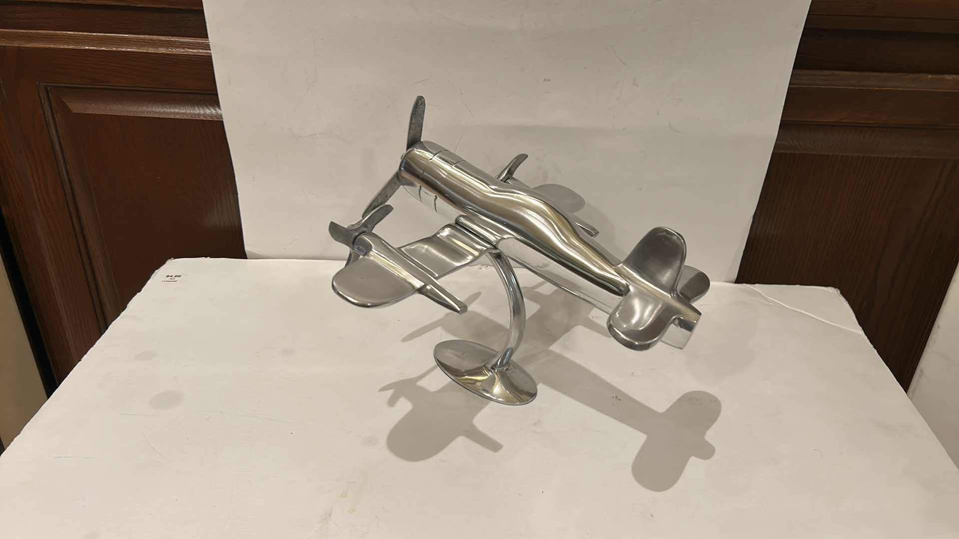 Photo 1 of POLISHED ALUMINUM AIRPLANE SCULPTURE OR DESK MODEL 12” x H9”