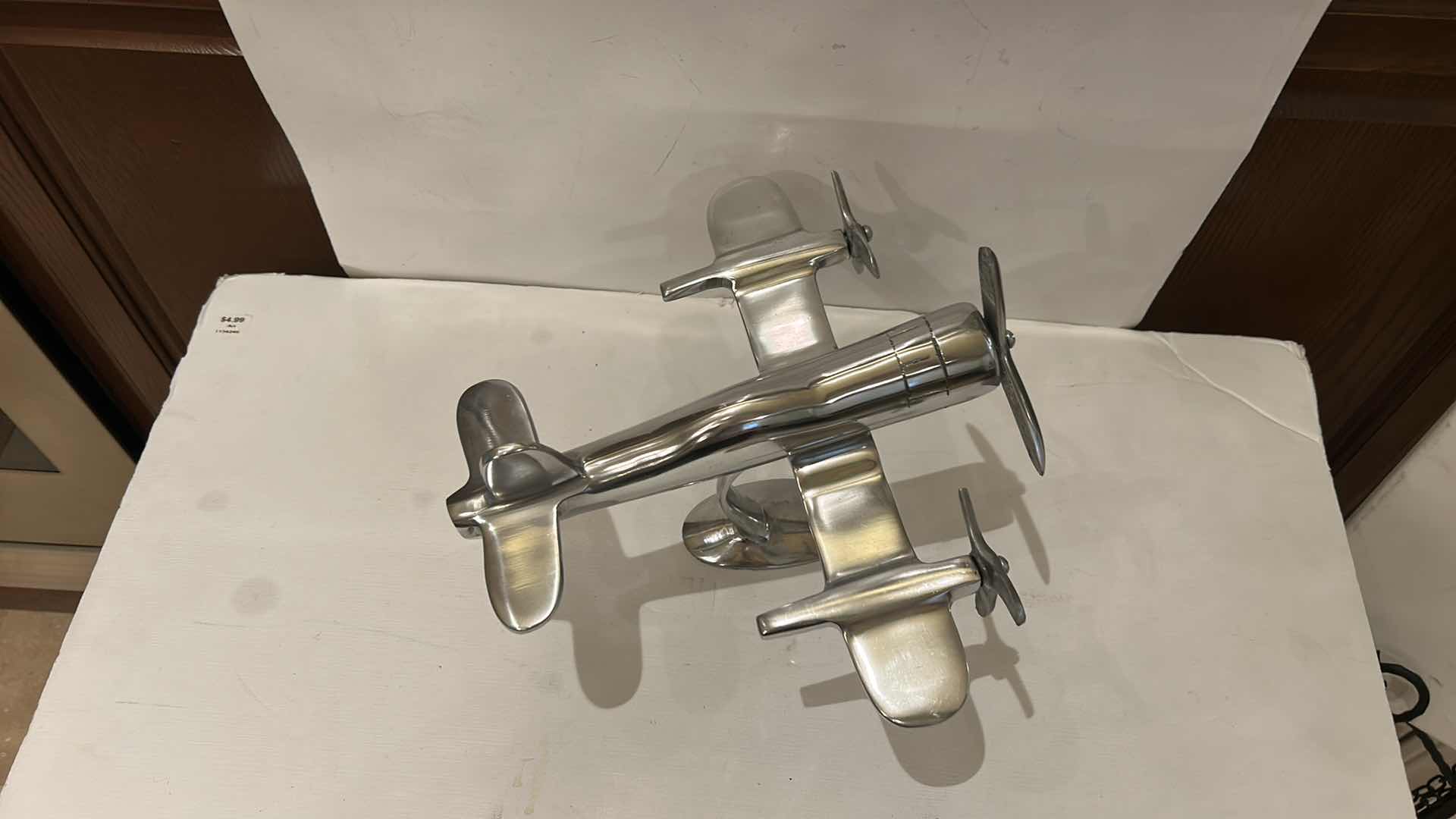 Photo 1 of POLISHED ALUMINUM AIRPLANE SCULPTURE OR DESK MODEL 12” x H9”