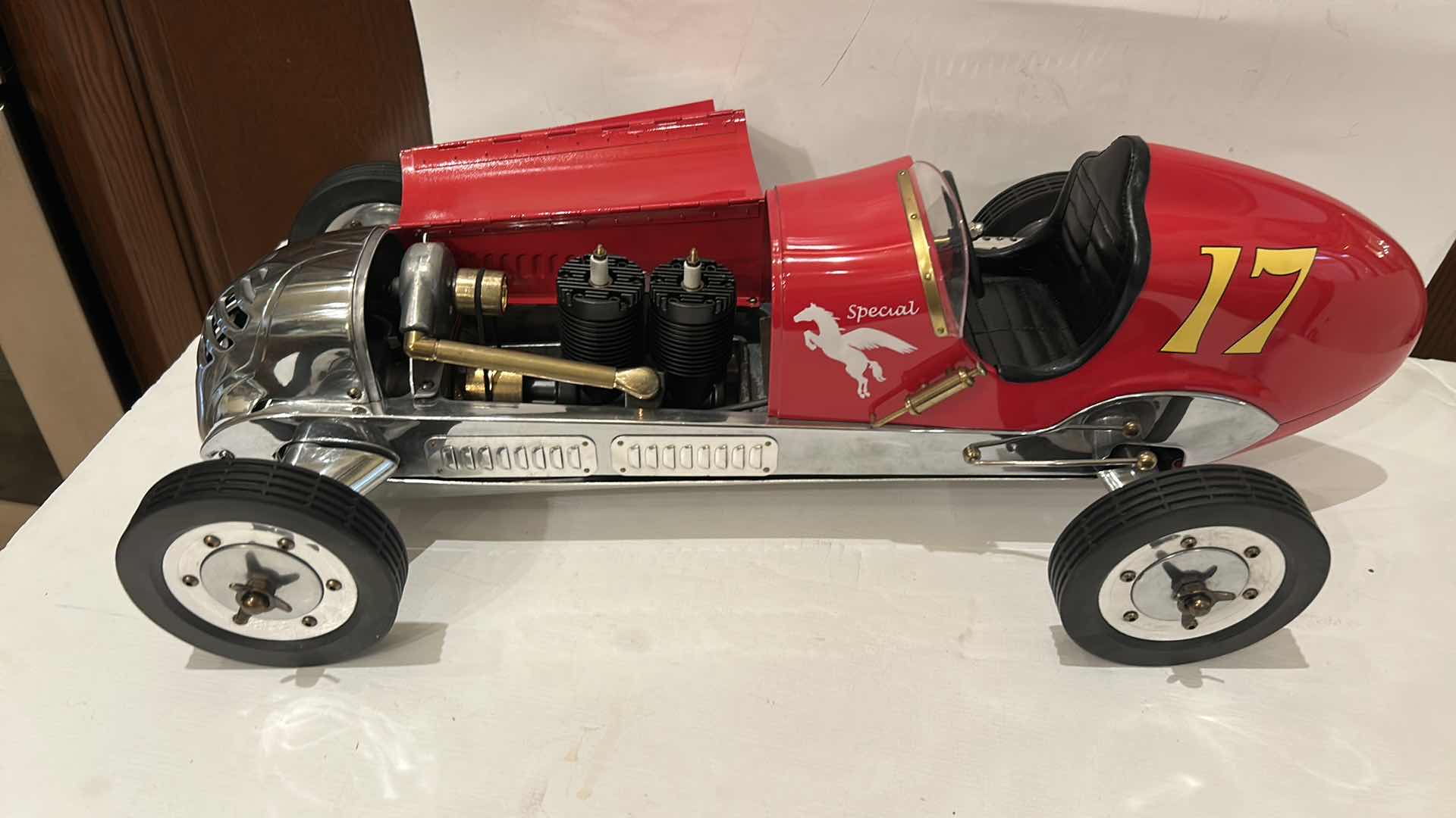 Photo 1 of $525 - DETAILED REPLICA MODEL OF A 1930S BB KORN TETHER CAR, ALSO KNOWN AS A SPINDIZZY RACER, CREATED BY AUTHENTIC MODELS.
THE MODEL IS HAND-BUILT AND HANDCRAFTED FROM POLISHED CAST ALUMINUM AND BRASS. 21” x 7 1/2”