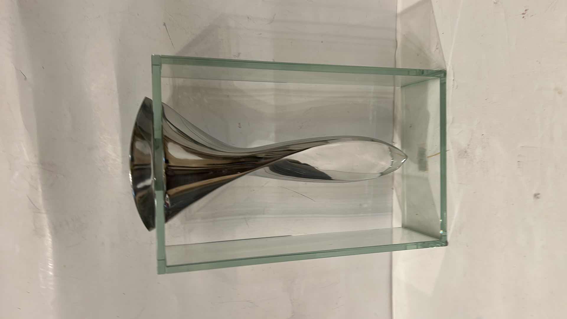 Photo 1 of MORI TWISTED TORNADO VASE MADE OF POLISHED CAST ALUMINUM AND BOXED GLASS H13 1/2”