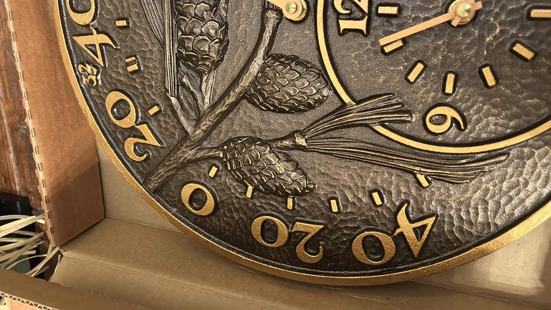 Photo 1 of NEW WHITETAIL PRODUCTS METAL PINECONE WALL CLOCK H 14”