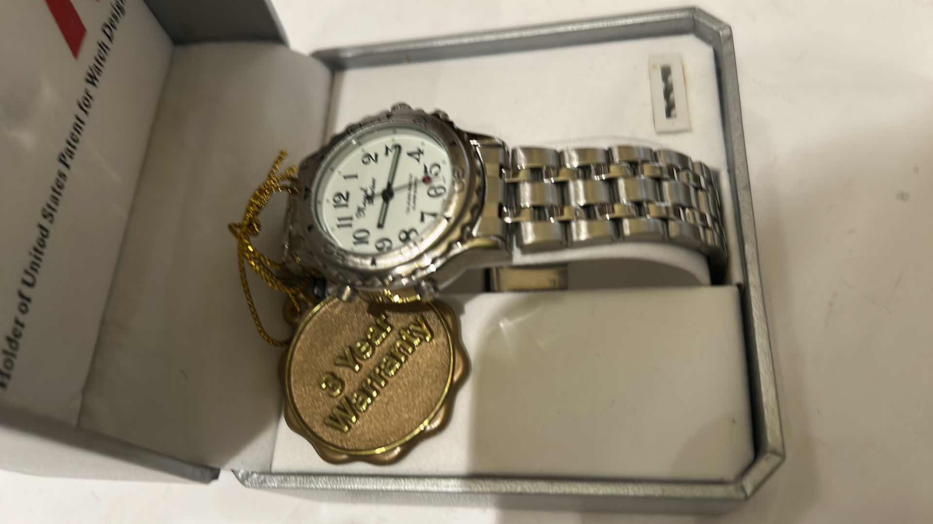 Photo 1 of MARCEL DRUCKER WOMEN’S SILVER 4-BUTTON BRACELET STYLE WATCH