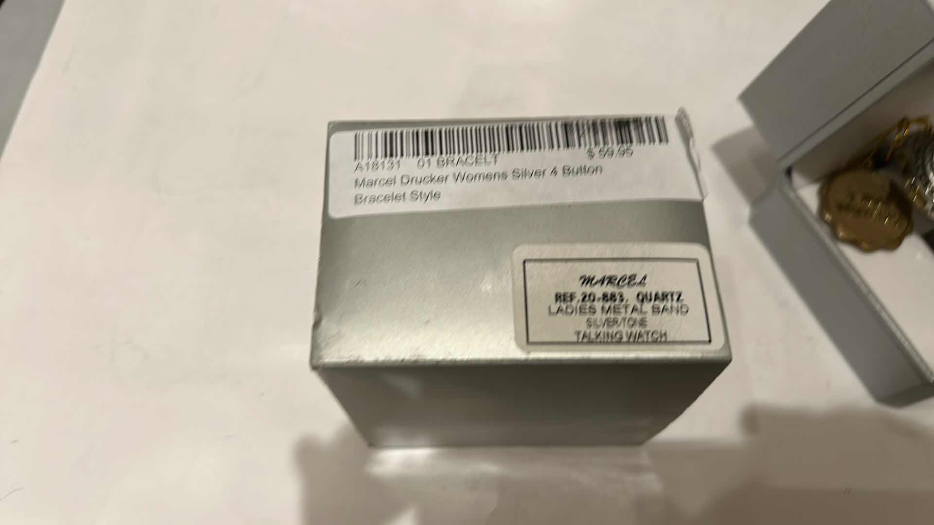 Photo 1 of MARCEL DRUCKER WOMEN’S SILVER 4-BUTTON BRACELET STYLE WATCH