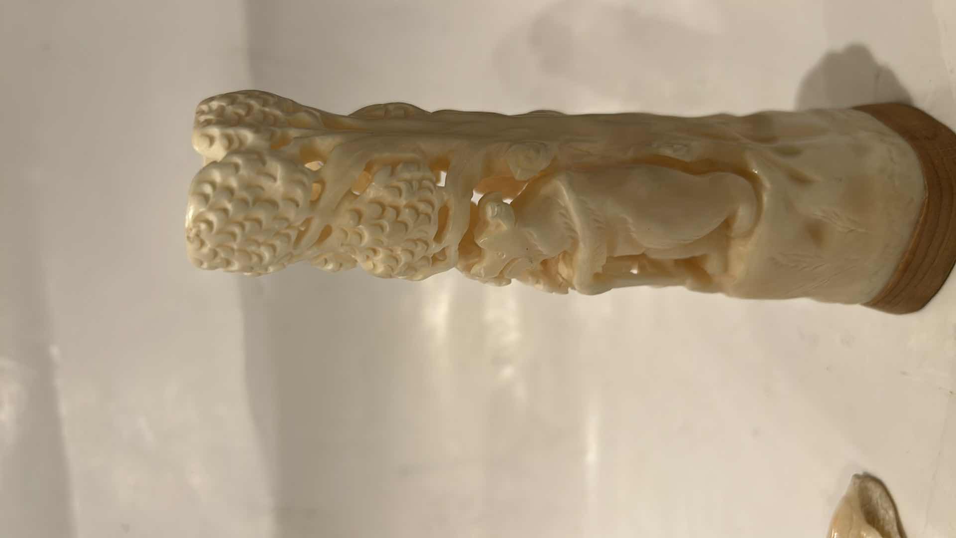 Photo 1 of 2 - IVORY OR BONE INTRICATELY HAND-CARVED AND PIERCED, DEPICTING FIGURES (POSSIBLY DEITIES OR MYTHICAL BEASTS) DOLPHINS AND NATURAL THEMES.
(TALLEST 5 1/2”)