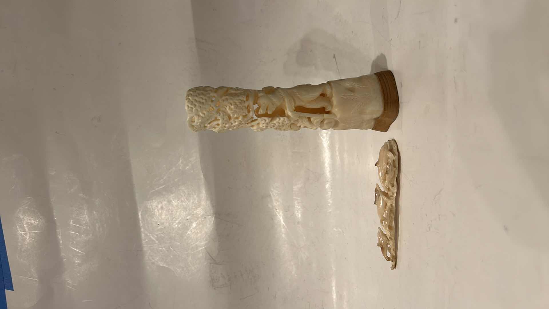 Photo 1 of 2 - IVORY OR BONE INTRICATELY HAND-CARVED AND PIERCED, DEPICTING FIGURES (POSSIBLY DEITIES OR MYTHICAL BEASTS) DOLPHINS AND NATURAL THEMES.
(TALLEST 5 1/2”)