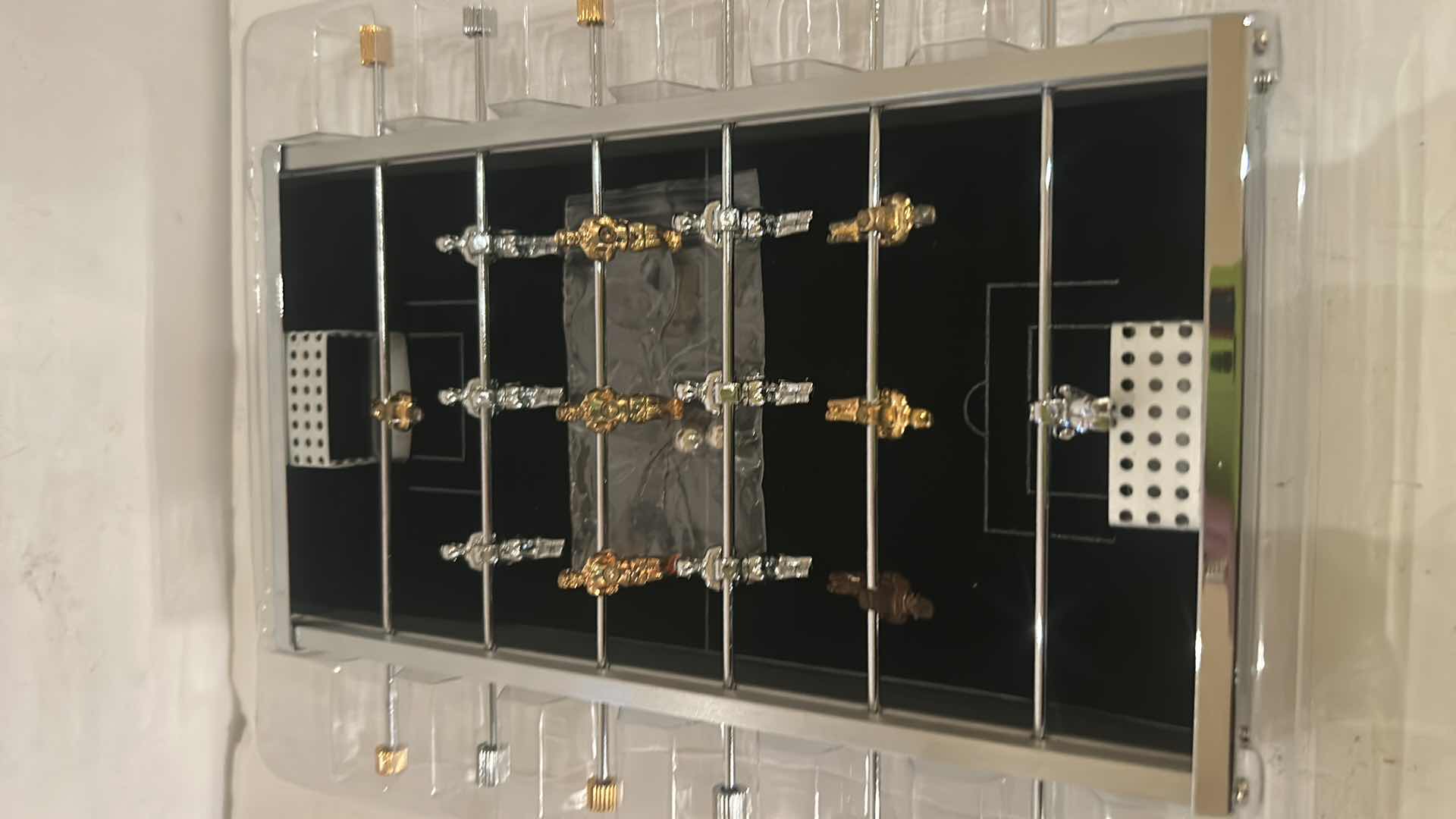 Photo 1 of MINIATURE CROSS FOOSBALL GAME 9” x 7 1/2”