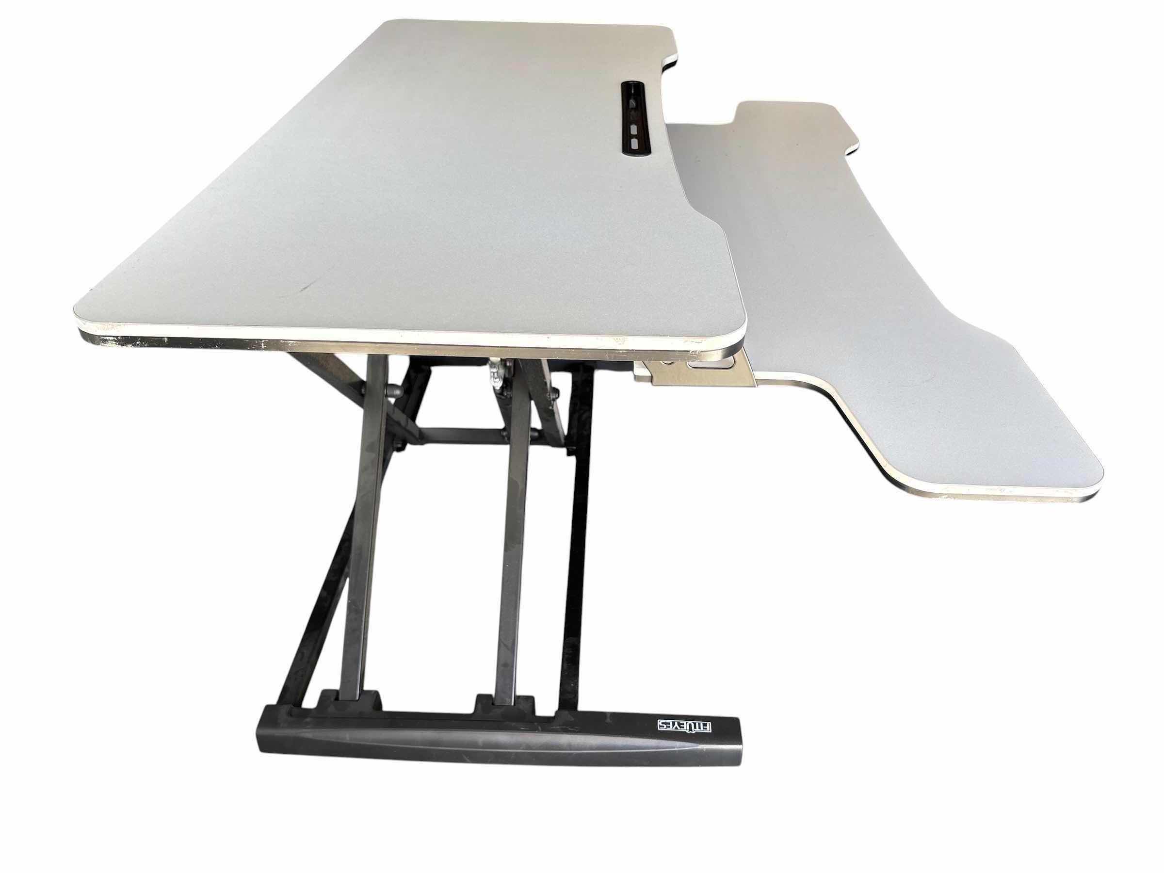 Photo 1 of FITUEYES WHITE W BLACK BASE HEIGHT ADJUSTABLE DESK CONVERTER H20”