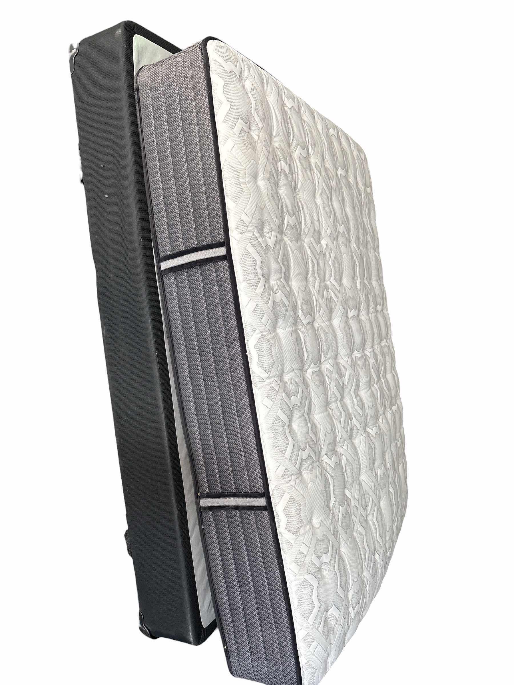Photo 1 of SEALY PREMIUM POSTUREPEDIC BOX SPRING AND MATTRESS QUEEN