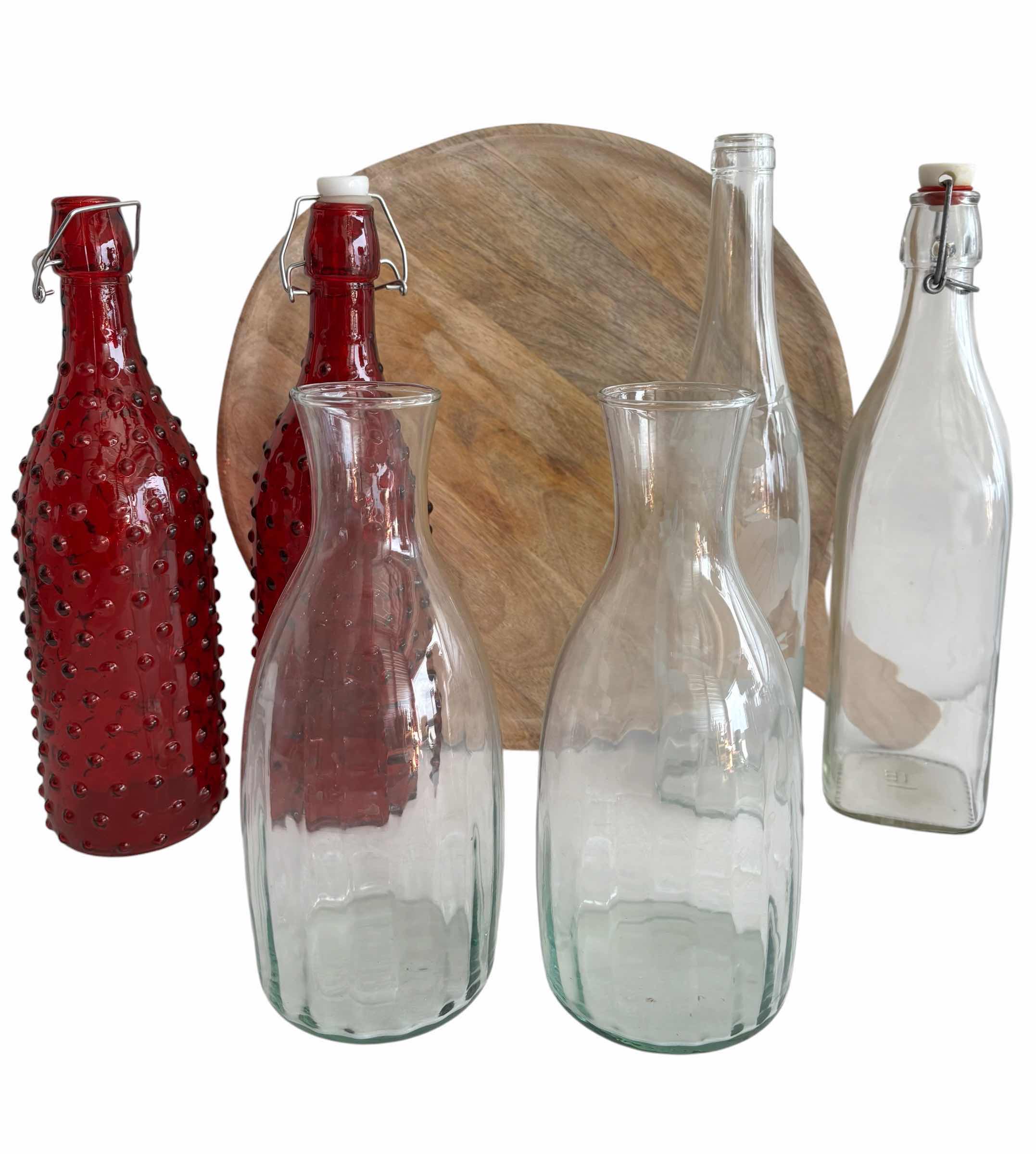 Photo 1 of WOODEN SERVING PADDLE, RED HOBNAIL GLASS BOTTLES & DECORATIVE GLASS BOTTLES (4)