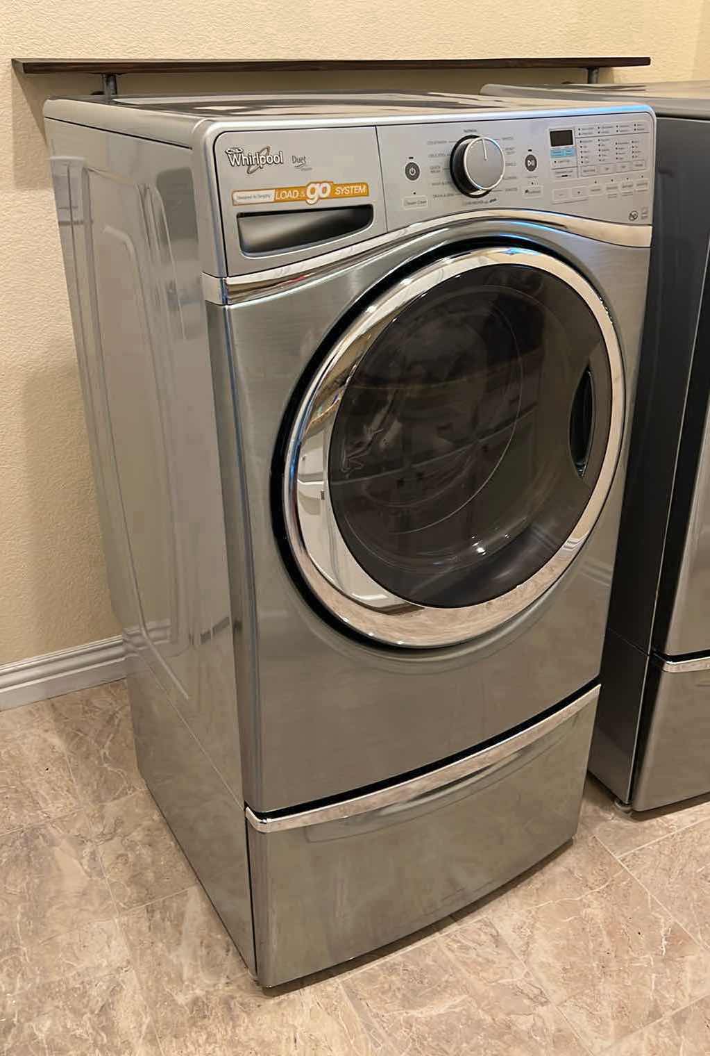 Photo 1 of CHROME WHIRLPOOL DUET HE FRONT LOAD & GO SYSTEM WASHER W PEDESTAL STORAGE