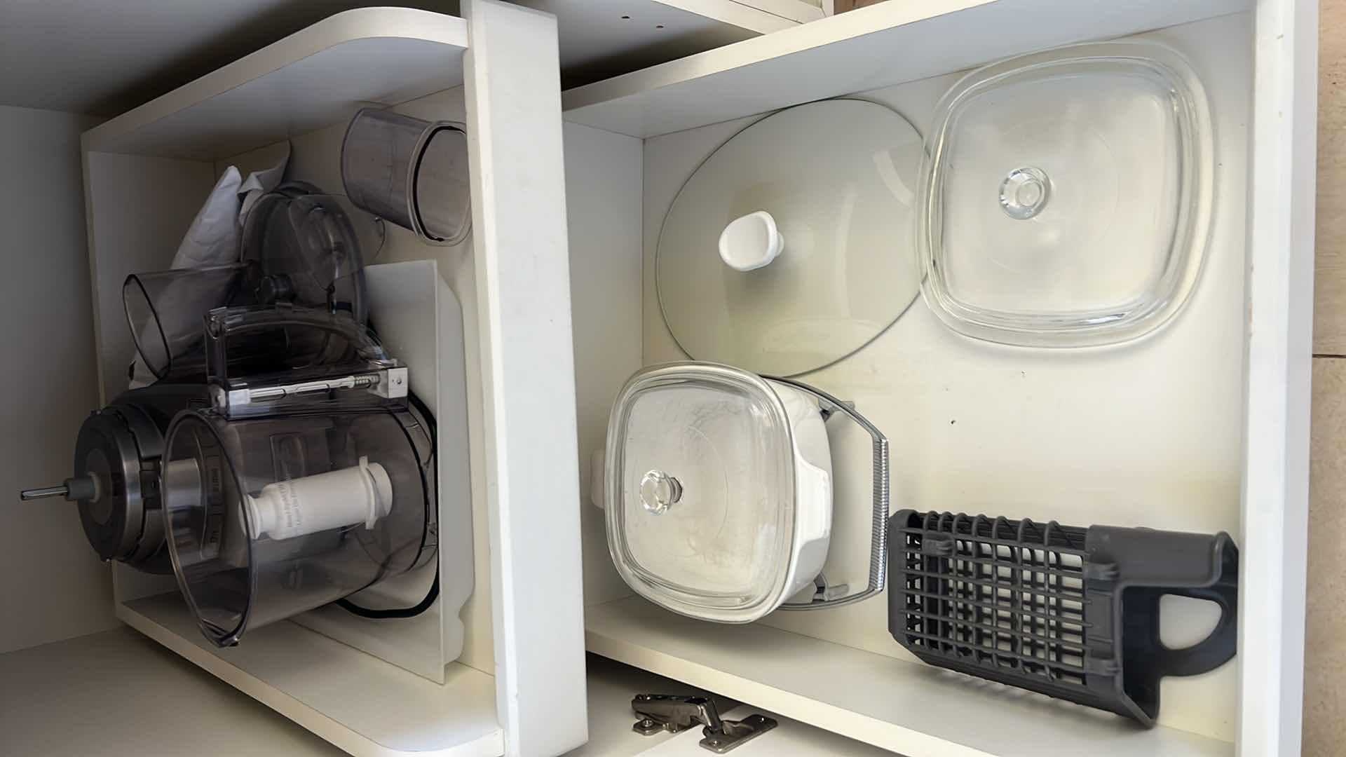 Photo 2 of CONTENTS OF 2 KITCHEN CABINETS-POTS & PANS, FOOD PROCESSOR, PASTA MATIC