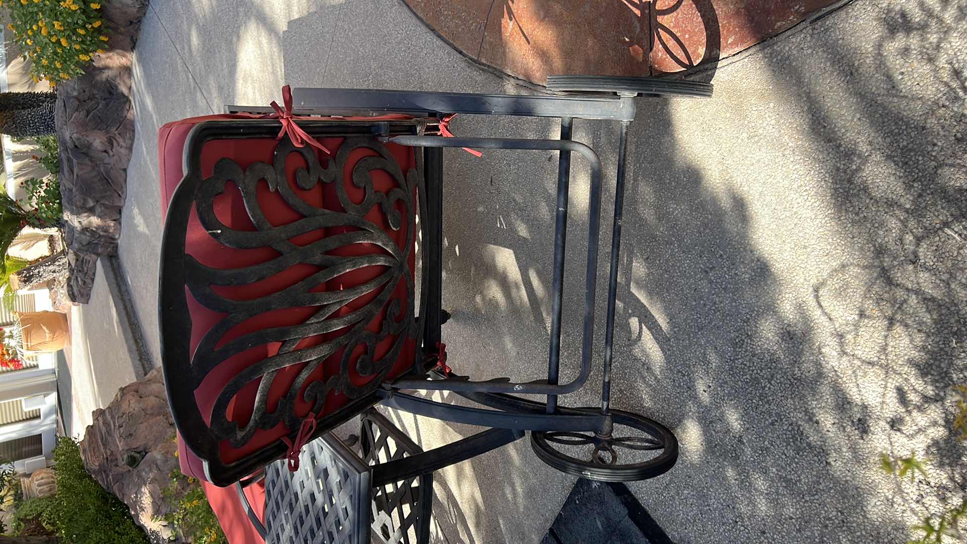 Photo 3 of BLACK METAL CHAISE LOUNGE W WHEELS & BURNT ORANGE CUSHION