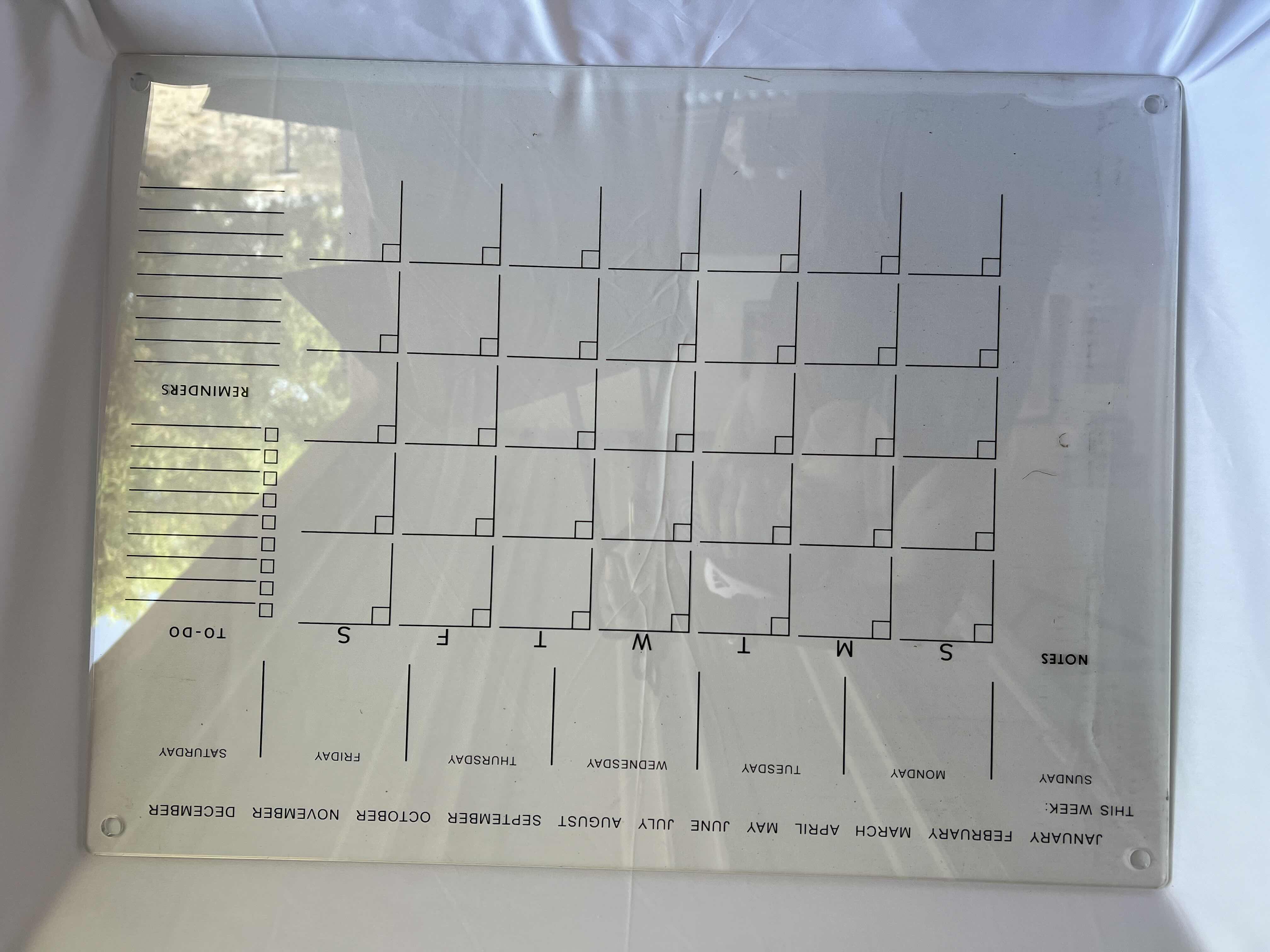 Photo 1 of BRANDNEW CLEAR LACQUER HANGING DRY ERASE CALENDAR 24” x 18” 