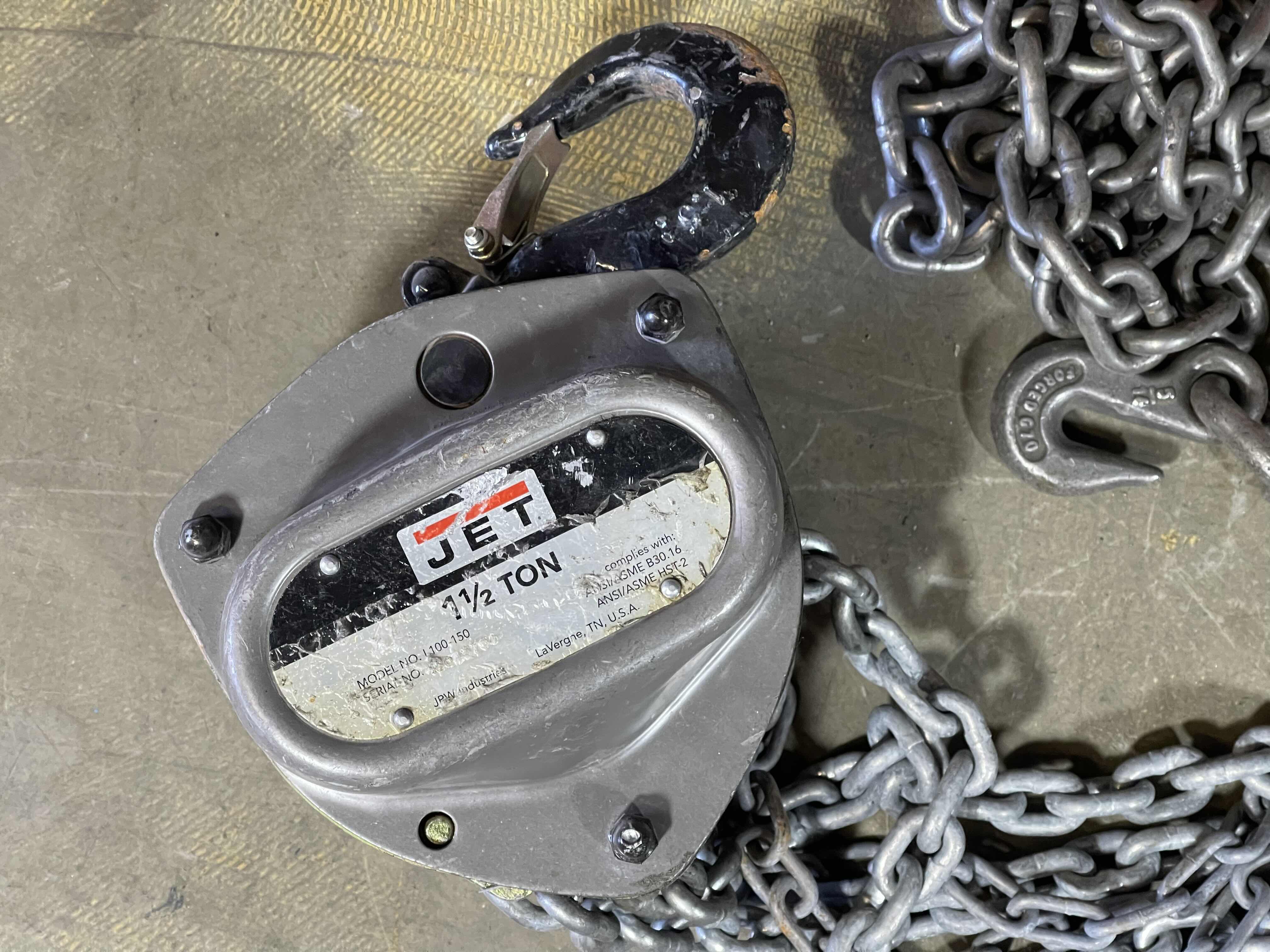 Photo 2 of JET 1 1/2 TON CHAIN HOIST MODEL NO. L 100-150 WITH (2) EXTRA CHAINS