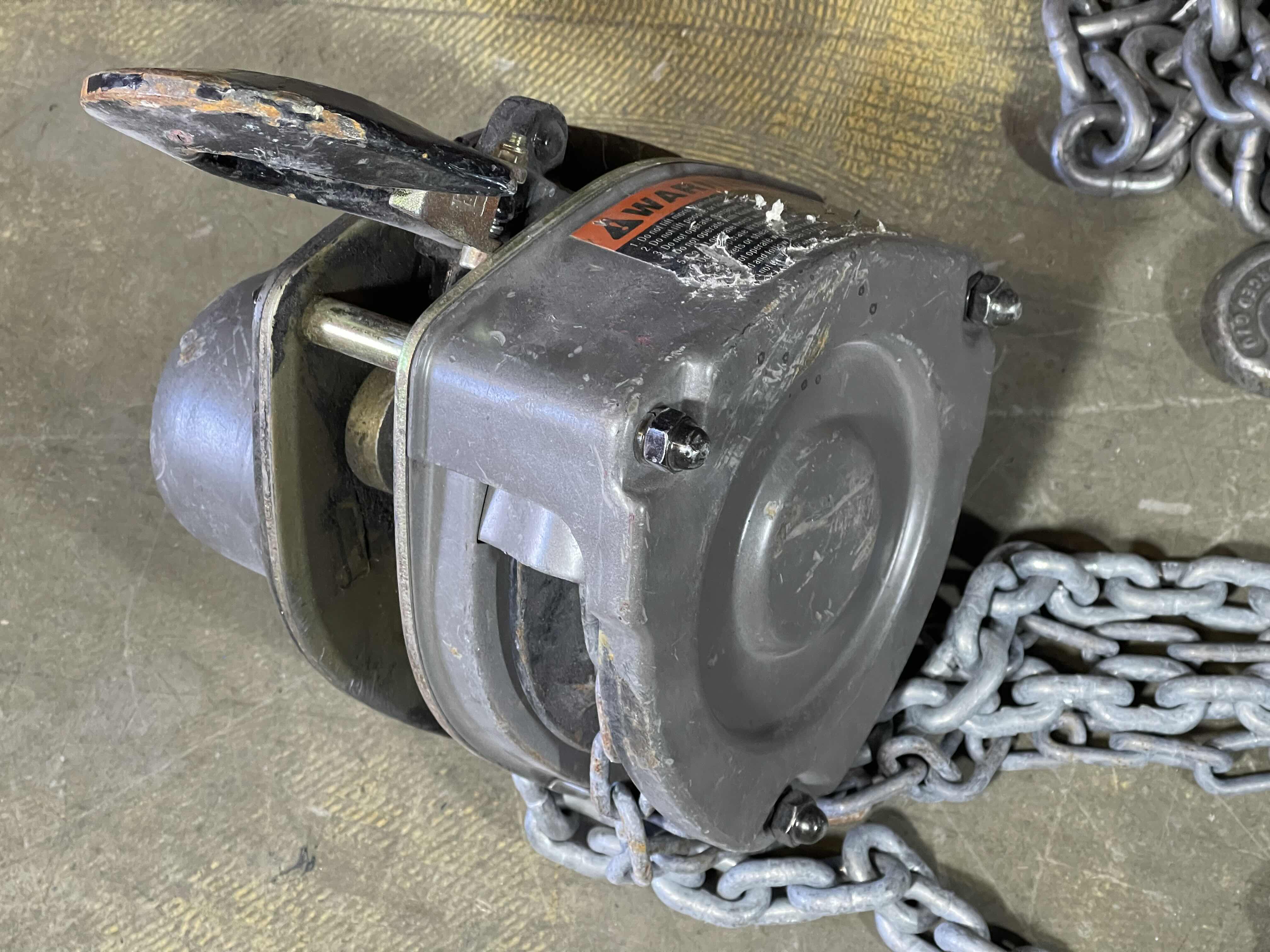 Photo 4 of JET 1 1/2 TON CHAIN HOIST MODEL NO. L 100-150 WITH (2) EXTRA CHAINS