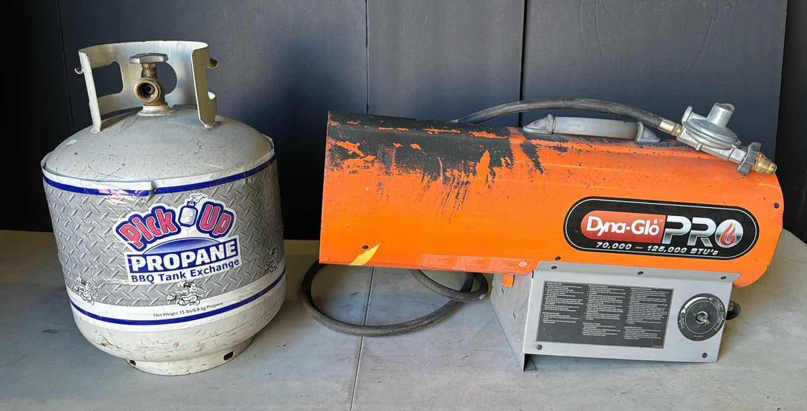 Photo 1 of DYNA-GLOBAL PRO PROPANE HEATER WITH EMPTY PROPANE TANK (SEE NOTES)
