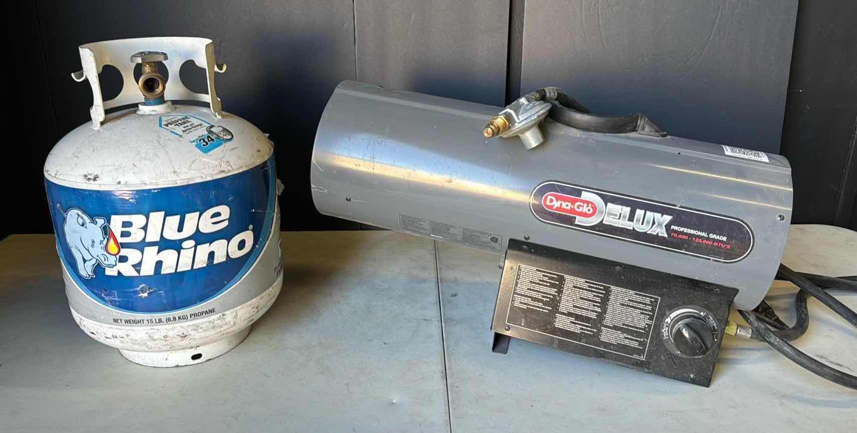 Photo 1 of DYNA-GLO DELUX PROPANE HEATER 70K-125K BTU & EMPTY PROPANE TANK