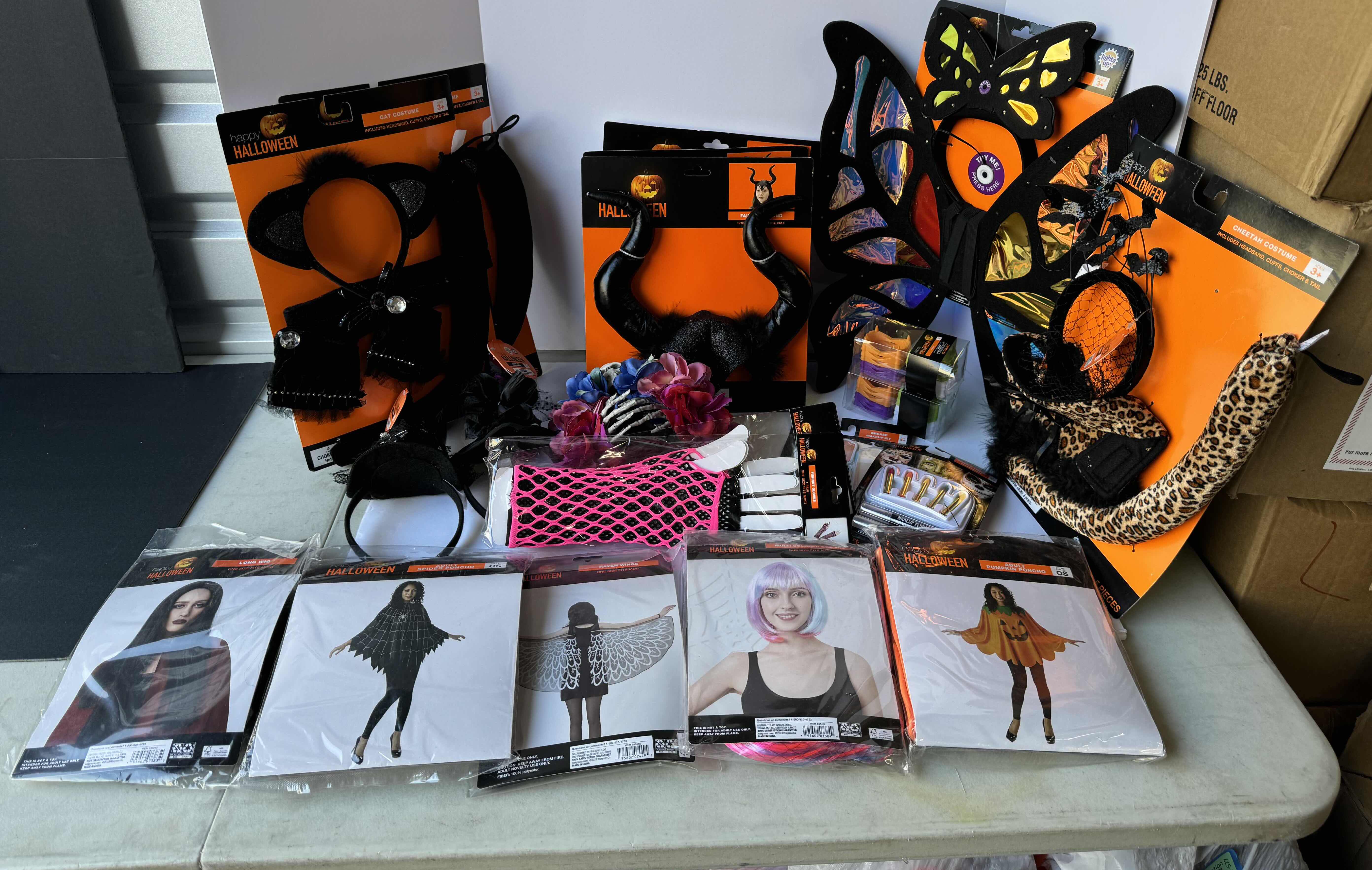 Photo 1 of HALLOWEEN COSTUMES, MASKS, HEADBANDS, WIGS & MAKE UP - LARGE ASSORTED LOT