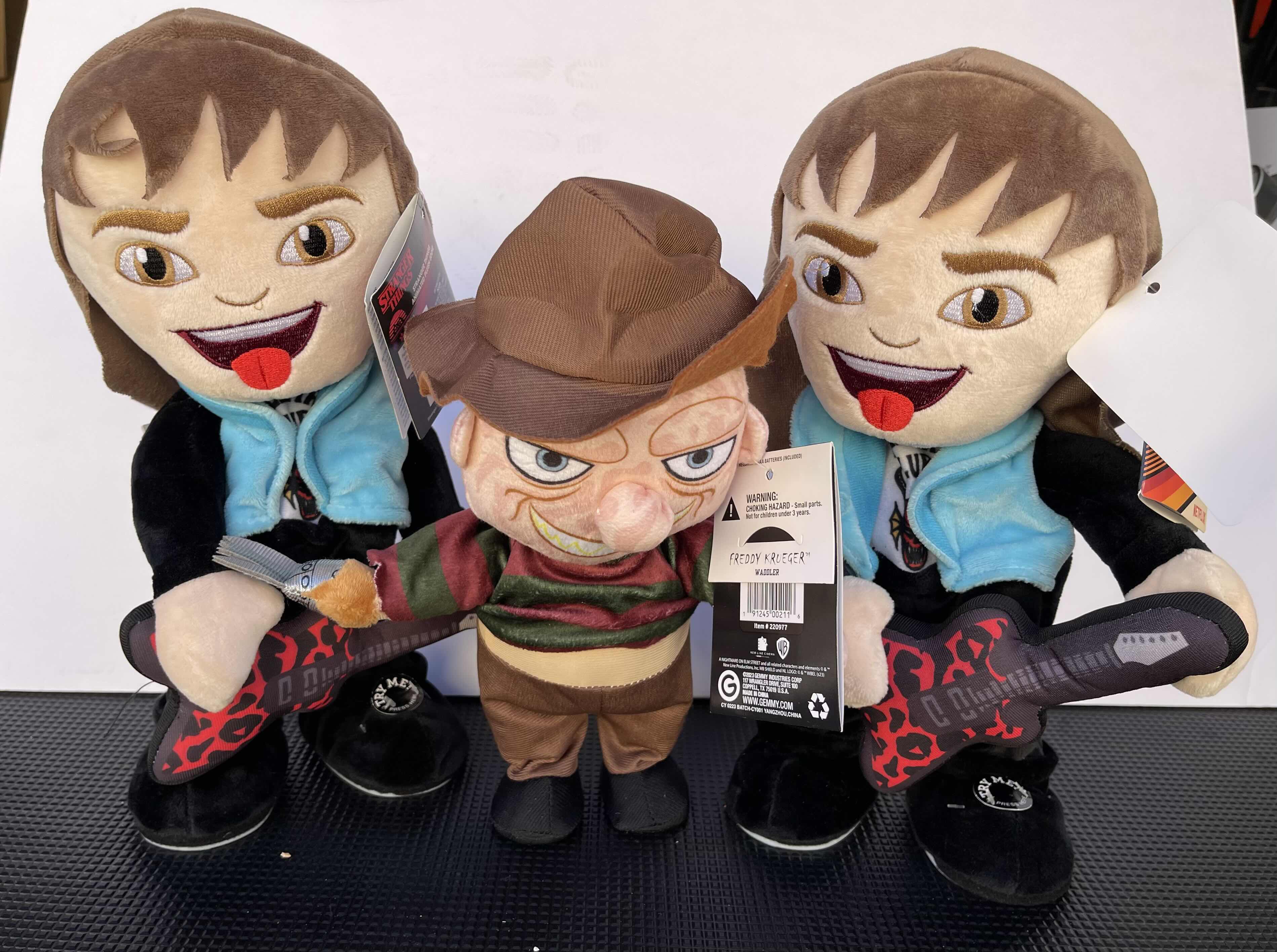 Photo 1 of A NIGHTMARE ON ELM STREET FREDY KRUGER 12” & STRANGER THINGS EDDIE 13” (2) ANIMATED PLUSH NWT