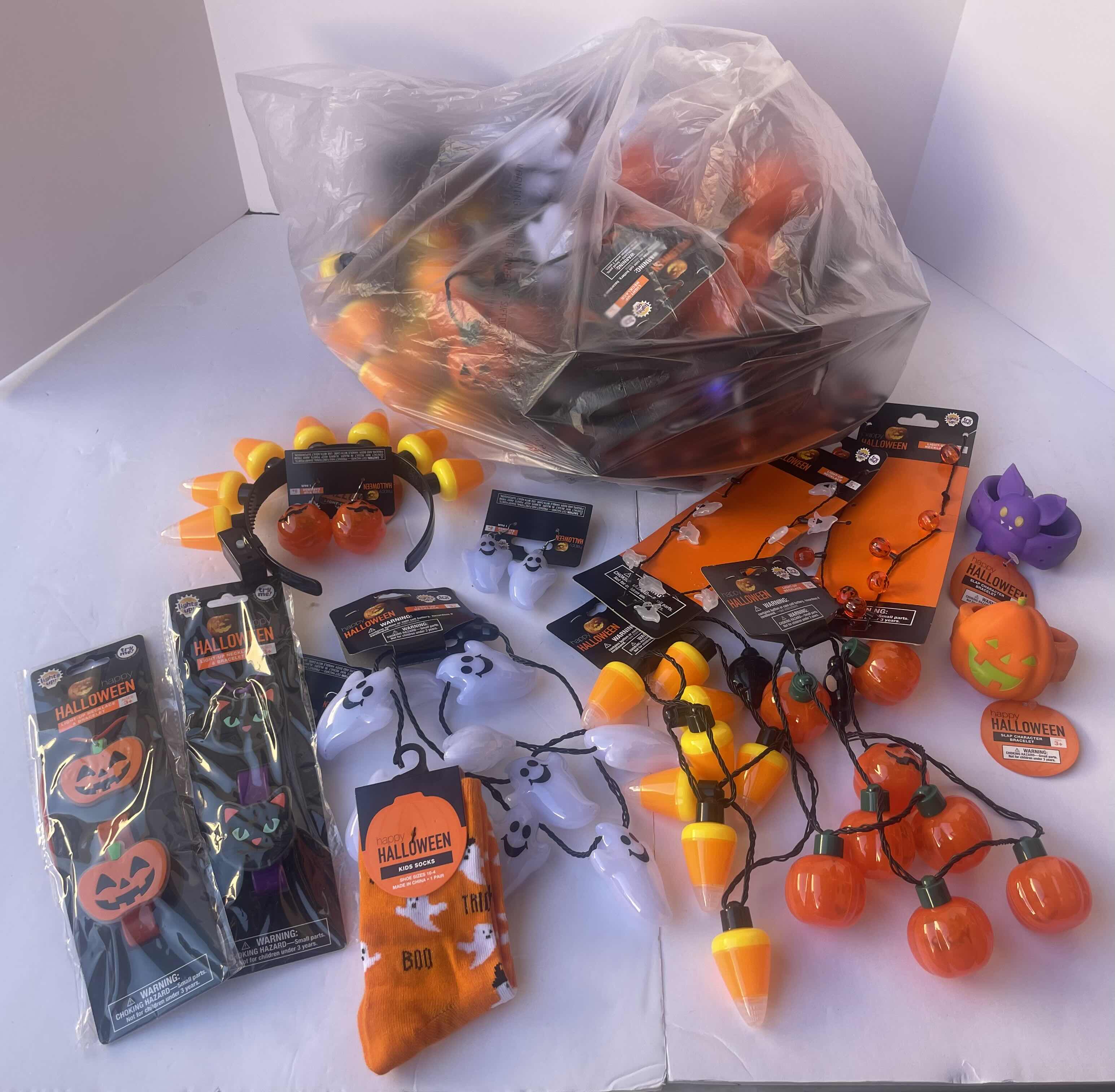 Photo 1 of NEW HAPPY HALLOWEEN LIGHT-UP NECKLACES, HEAD BANDS, BRACELETS AND OTHER FUN HALLOWEEN WEAR (30 PIECES)
