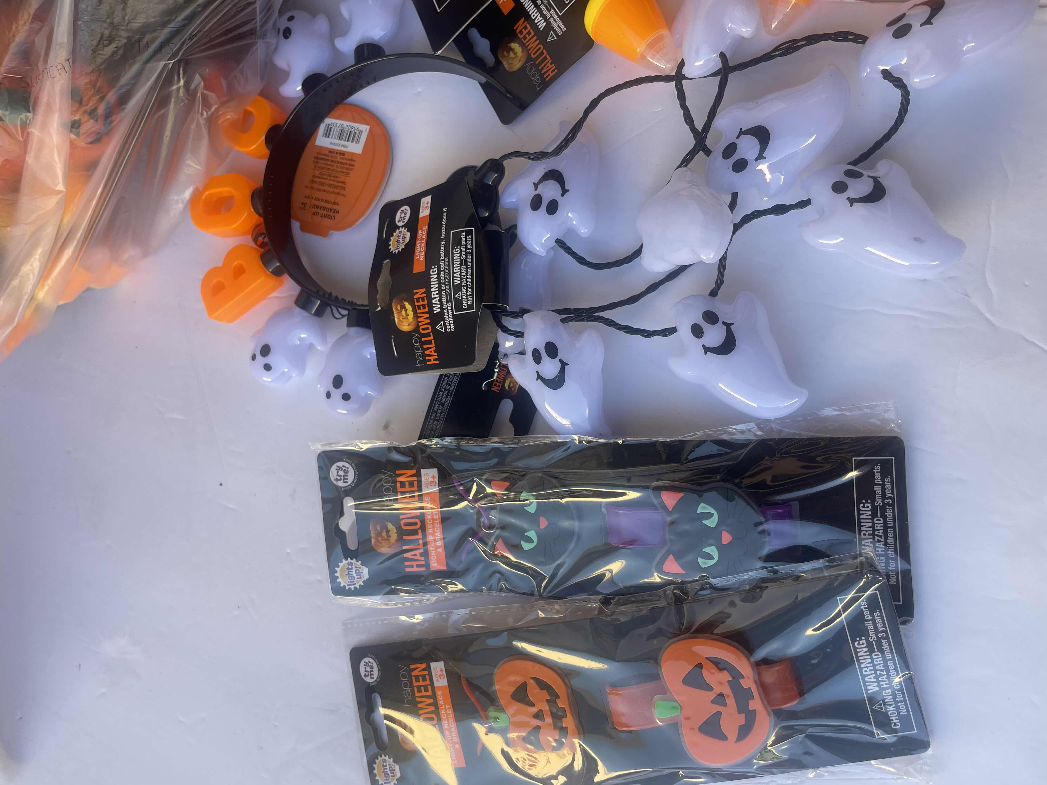 Photo 2 of NEW HAPPY HALLOWEEN LIGHT-UP NECKLACES. HEADBANDS, BRACELETS AND OTHER FUN HALLOWEEN WEAR (30 PIECES)
