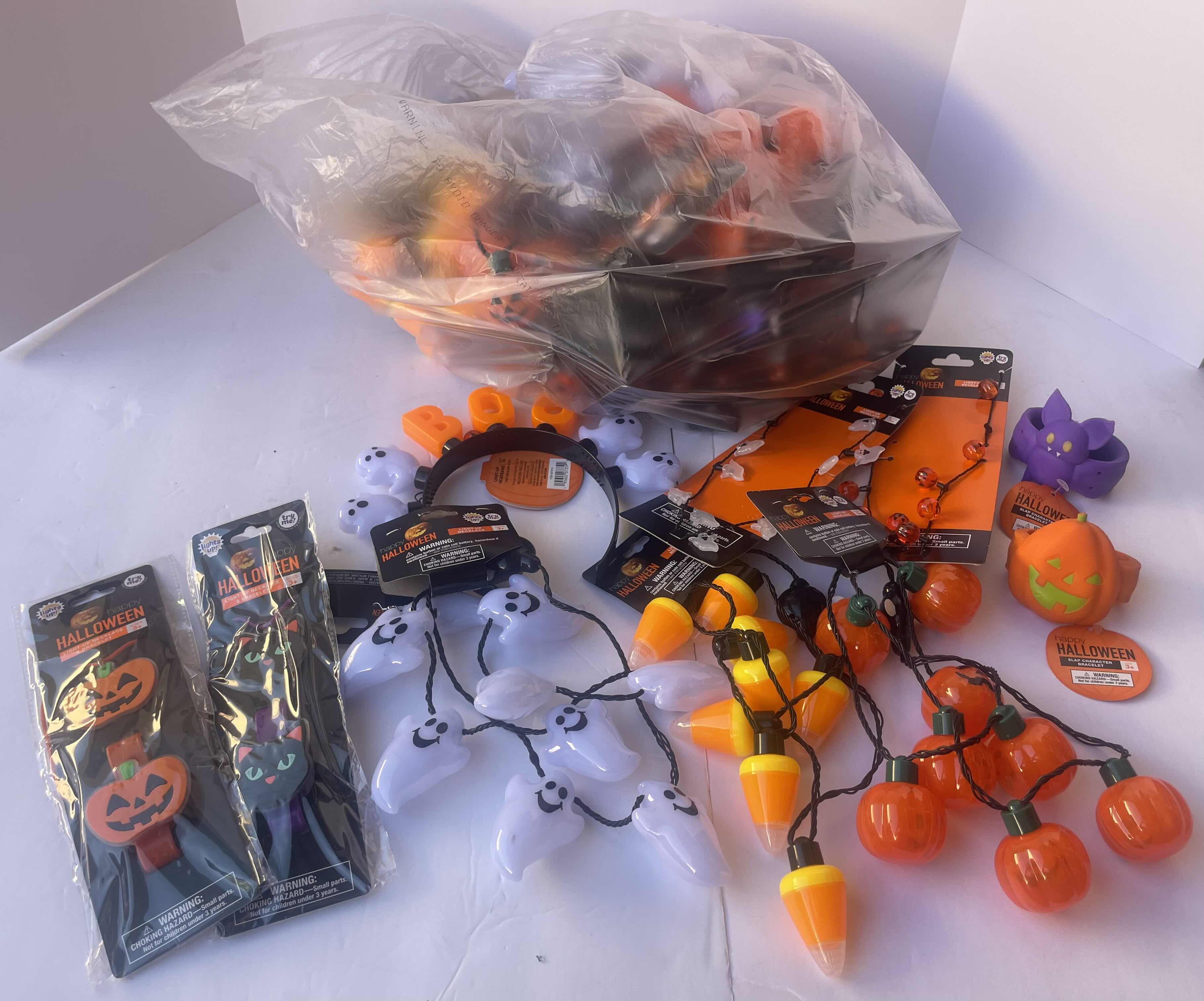 Photo 1 of NEW HAPPY HALLOWEEN LIGHT-UP NECKLACES. HEADBANDS, BRACELETS AND OTHER FUN HALLOWEEN WEAR (30 PIECES)
